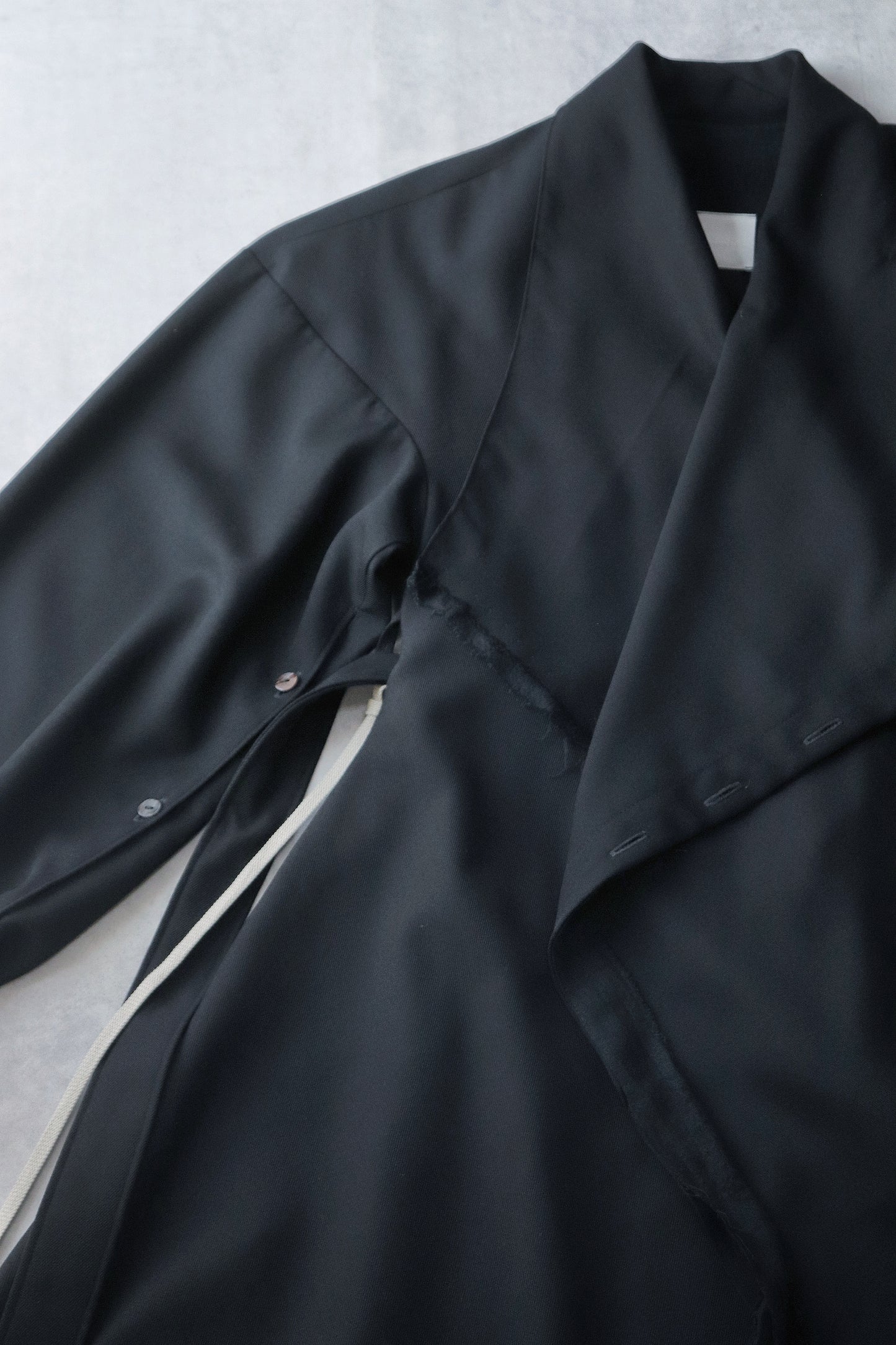 layered frayed coat
