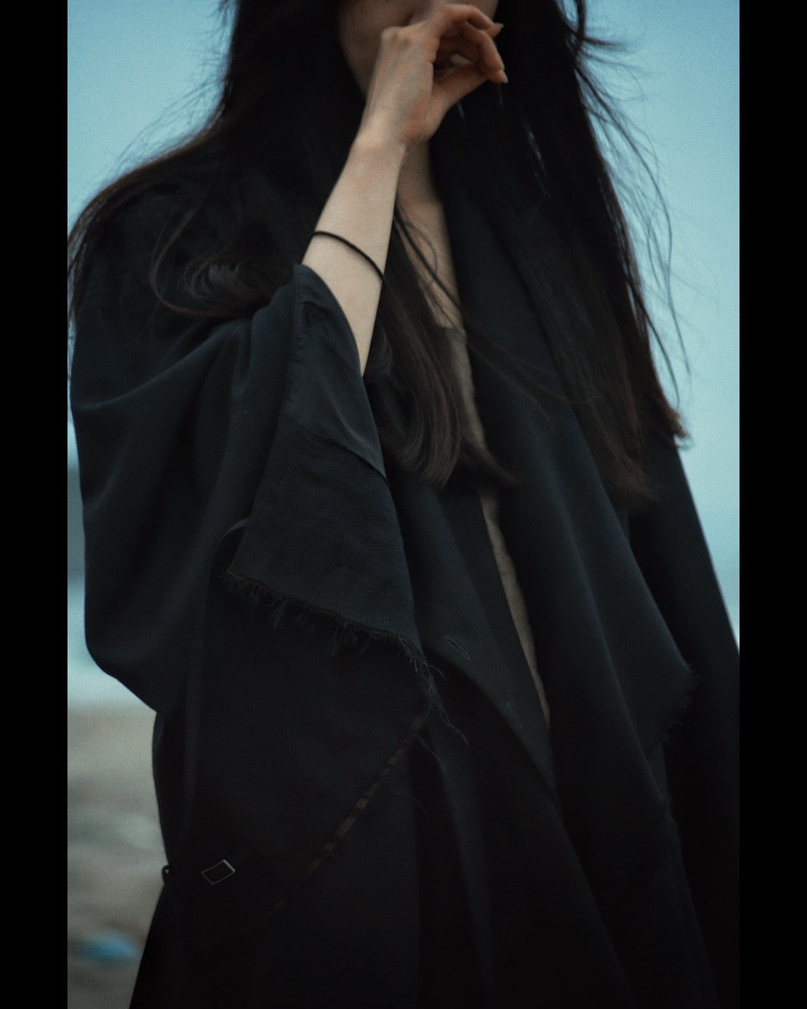 layered frayed coat