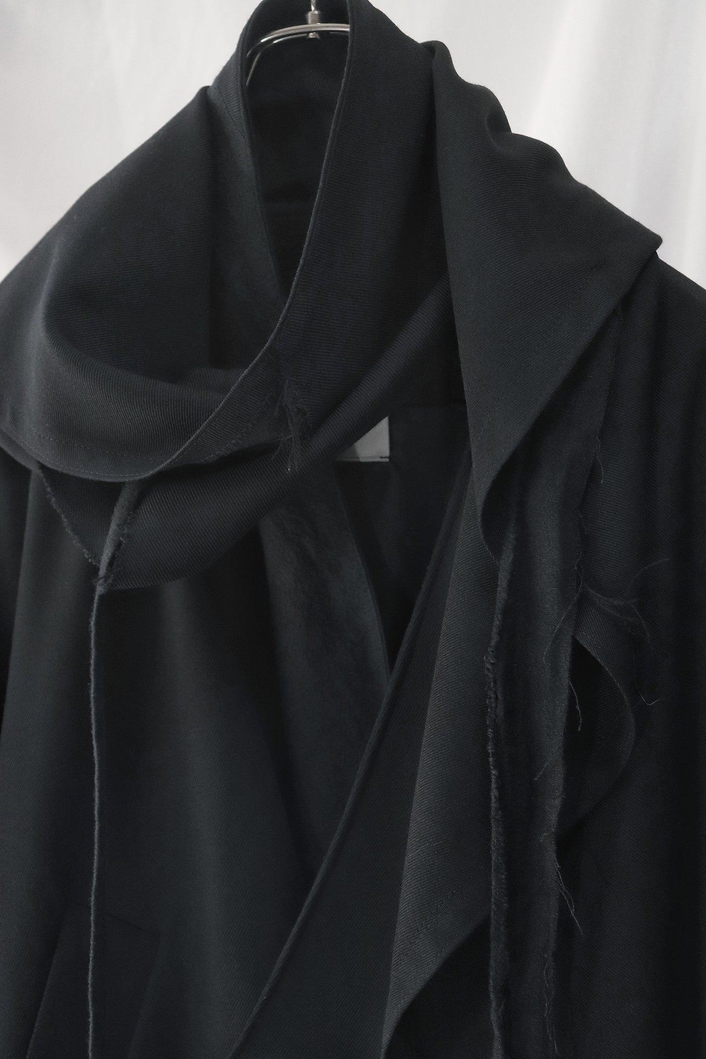 layered frayed coat