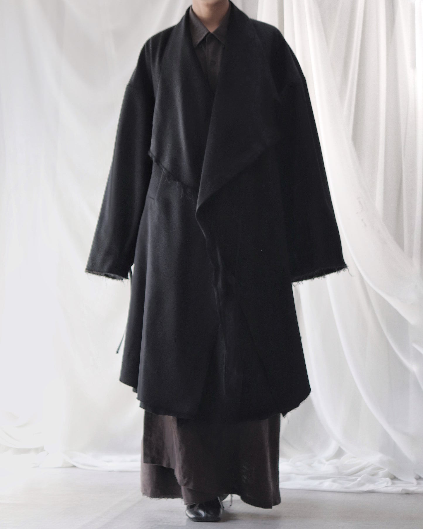 layered frayed coat