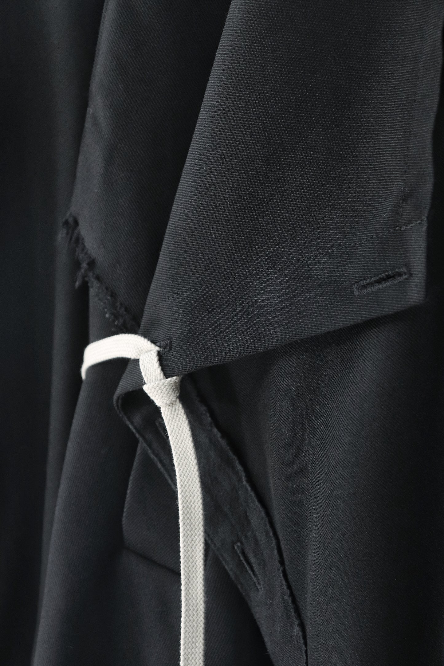 layered frayed coat