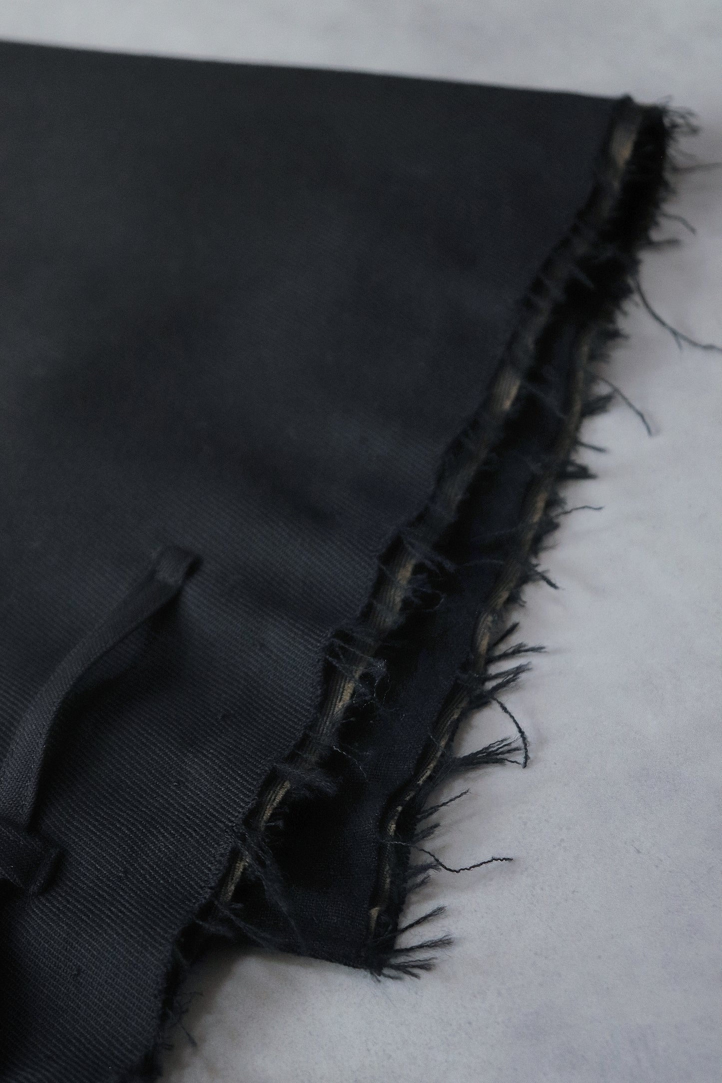 layered frayed coat