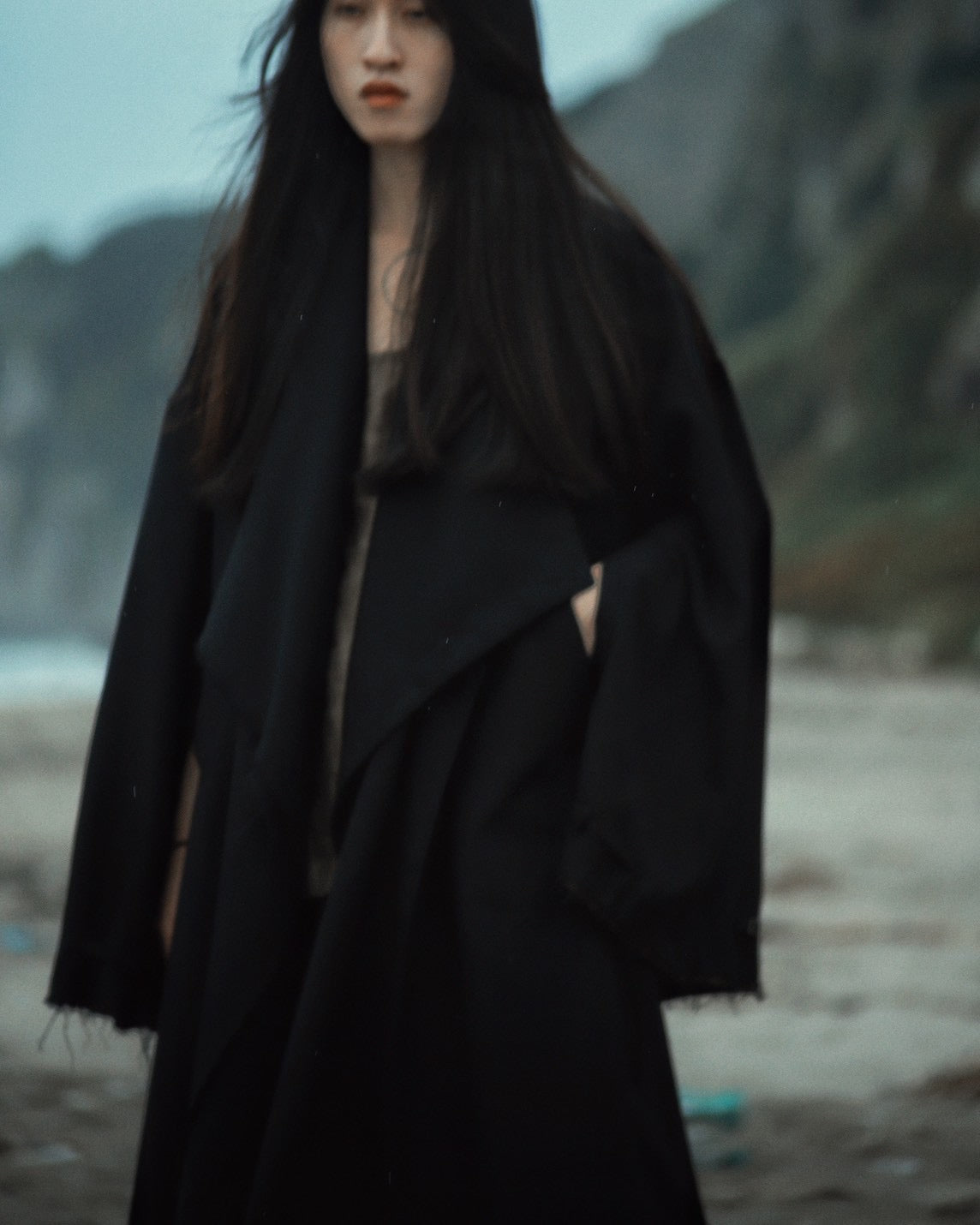 layered frayed coat