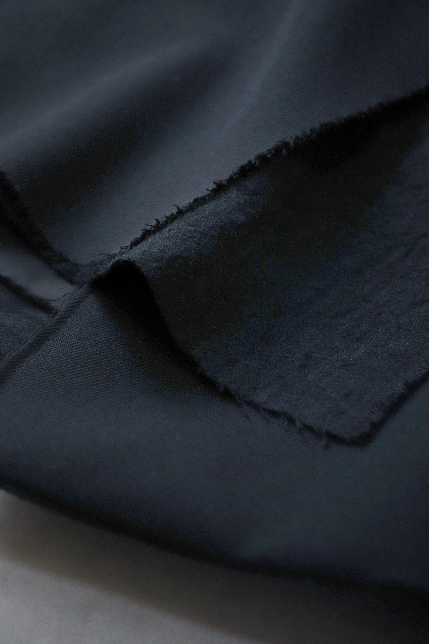 layered frayed coat