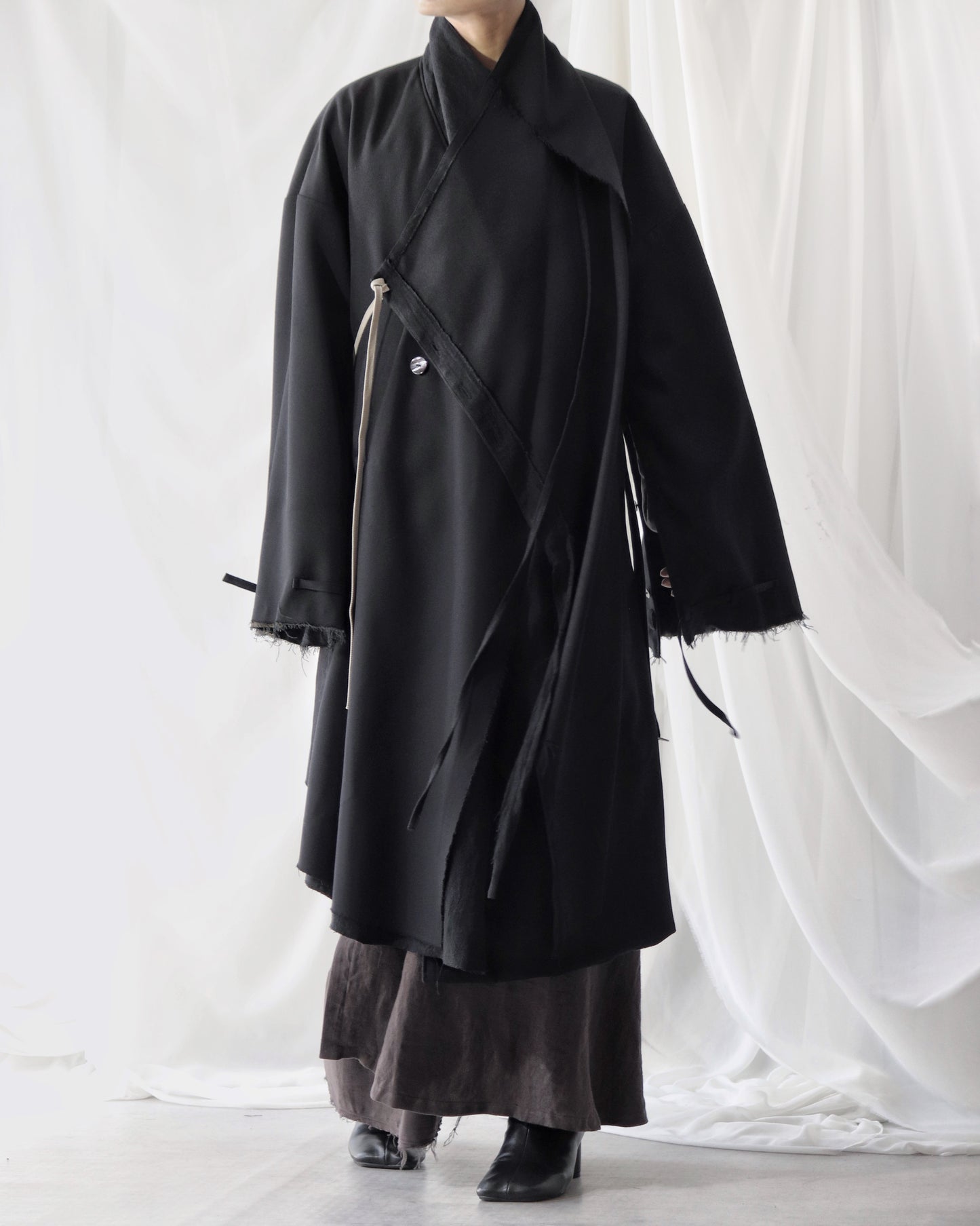 layered frayed coat