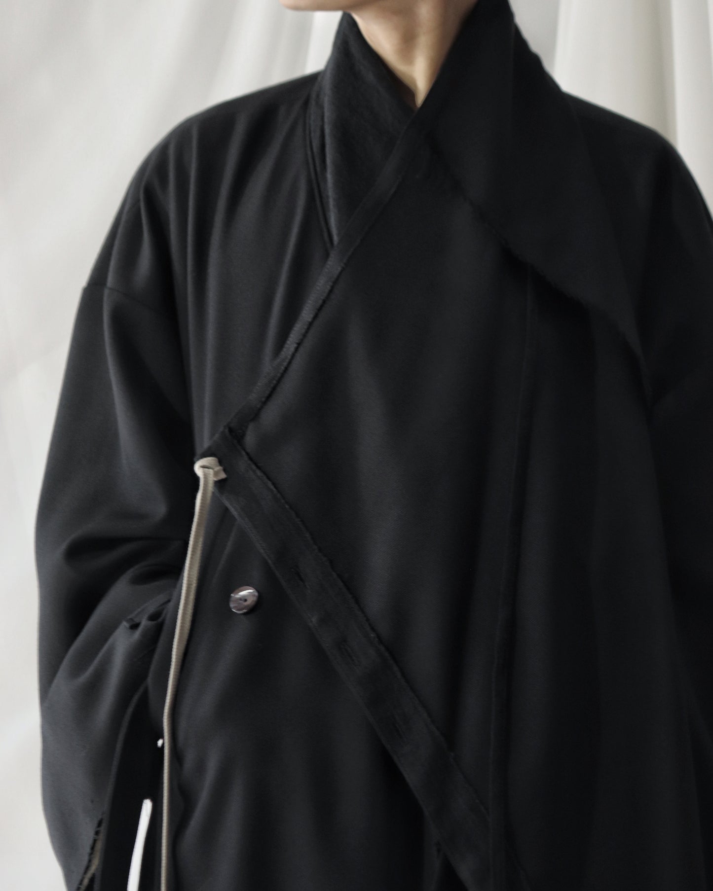 layered frayed coat