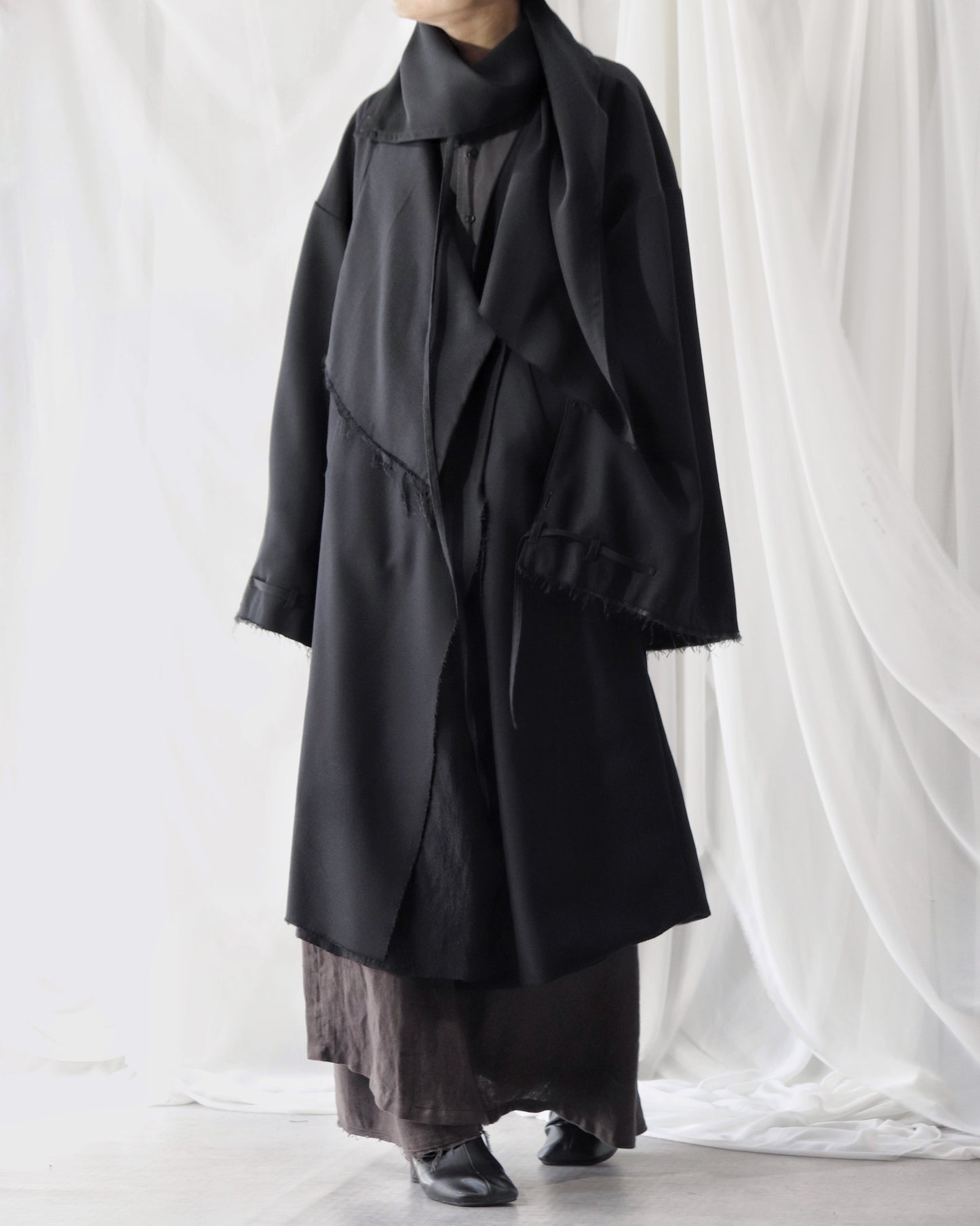 layered frayed coat