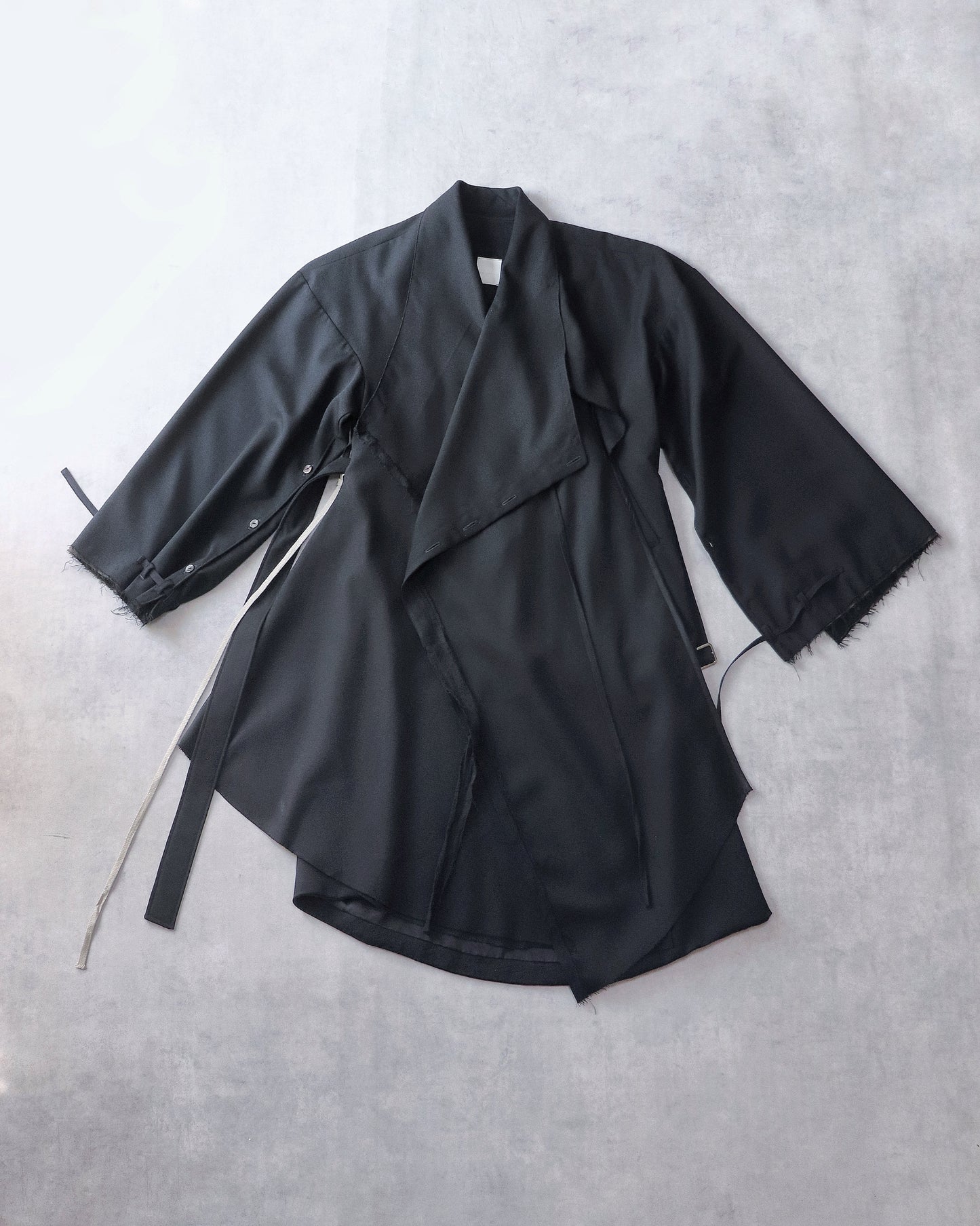 layered frayed coat