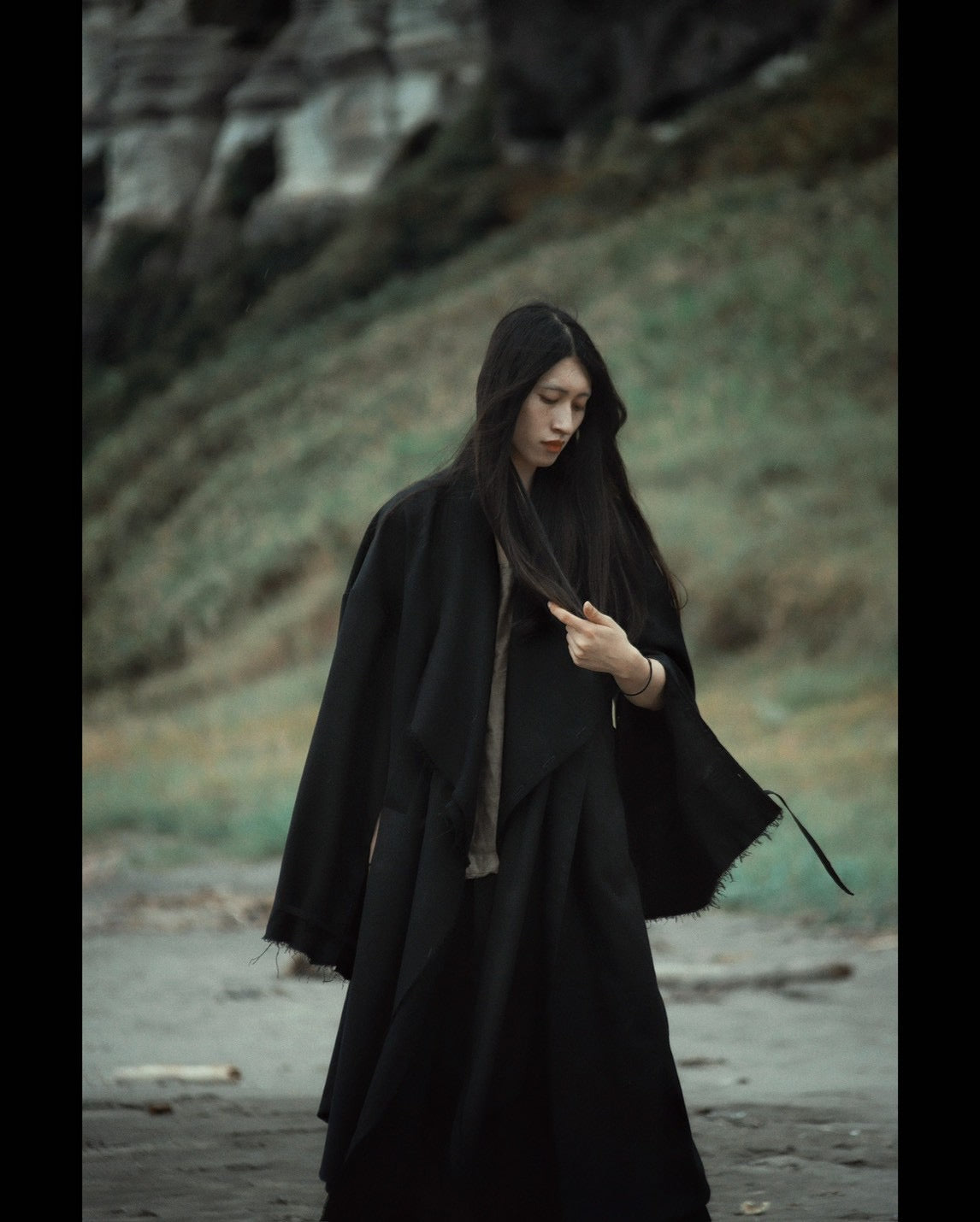 layered frayed coat