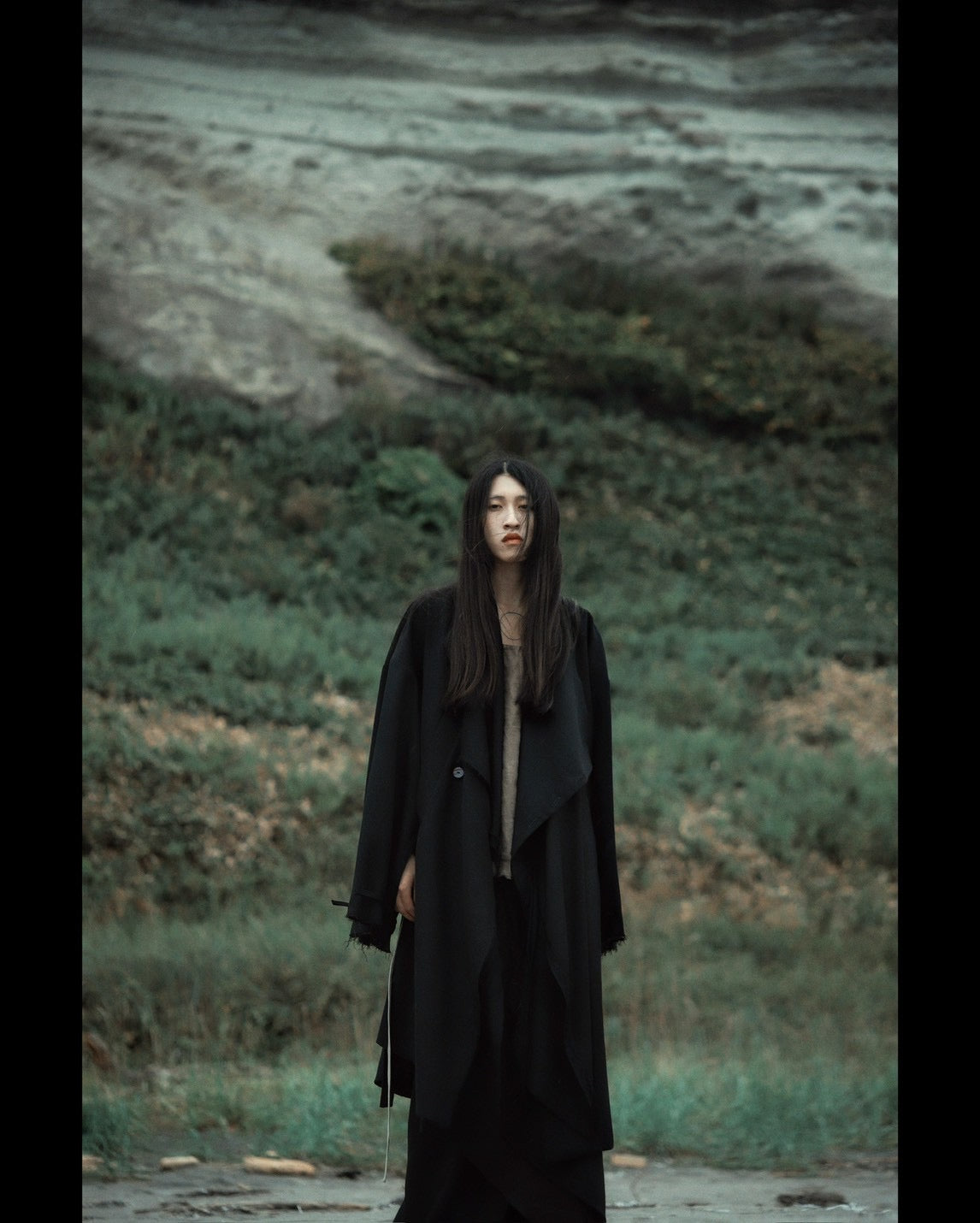 layered frayed coat