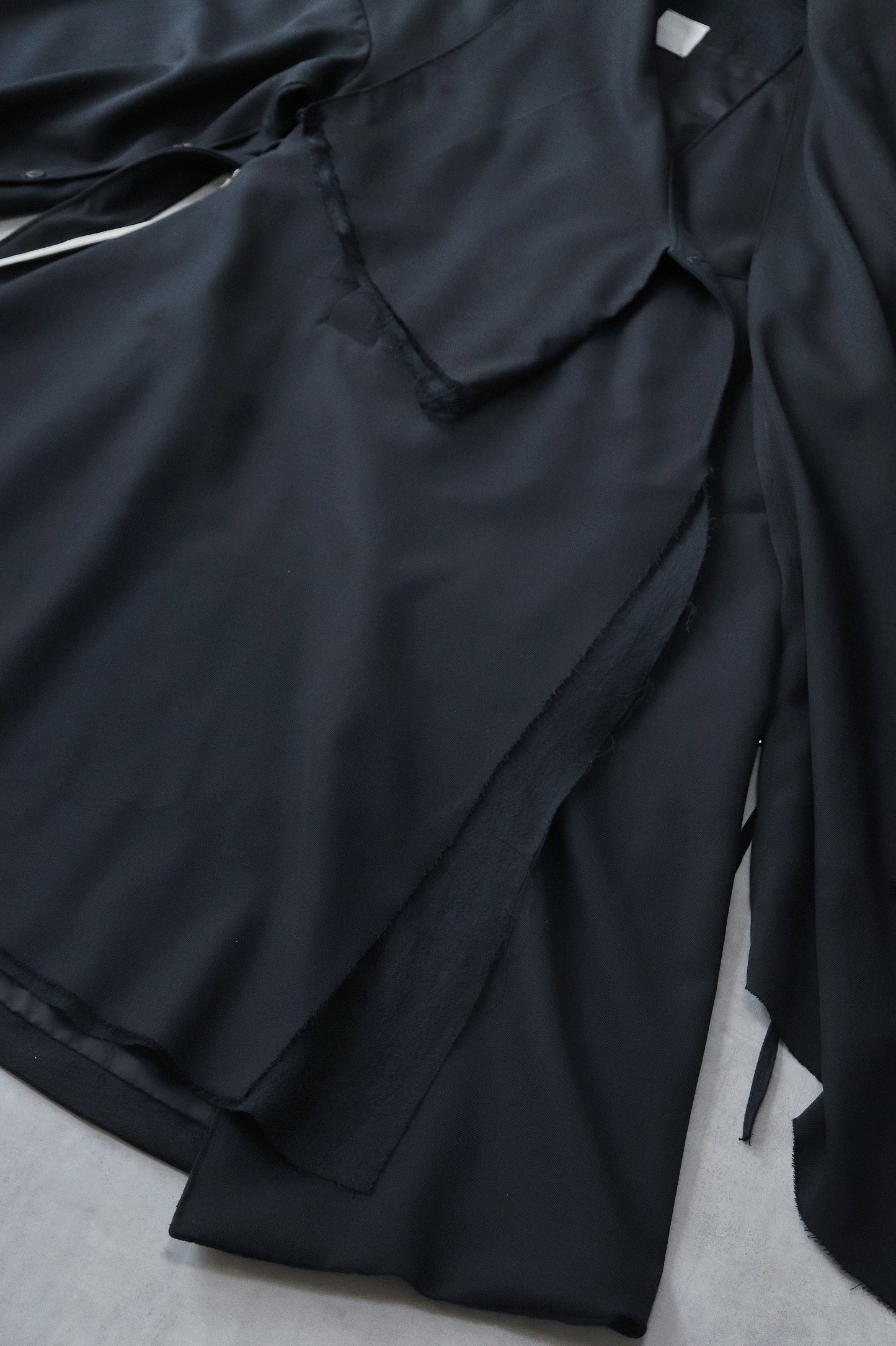 layered frayed coat