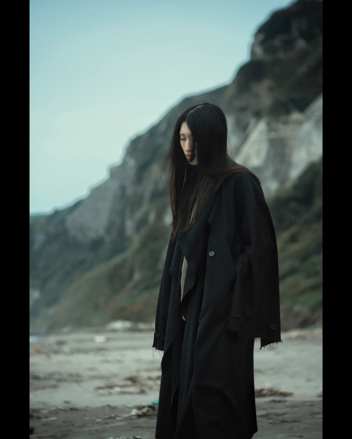 layered frayed coat