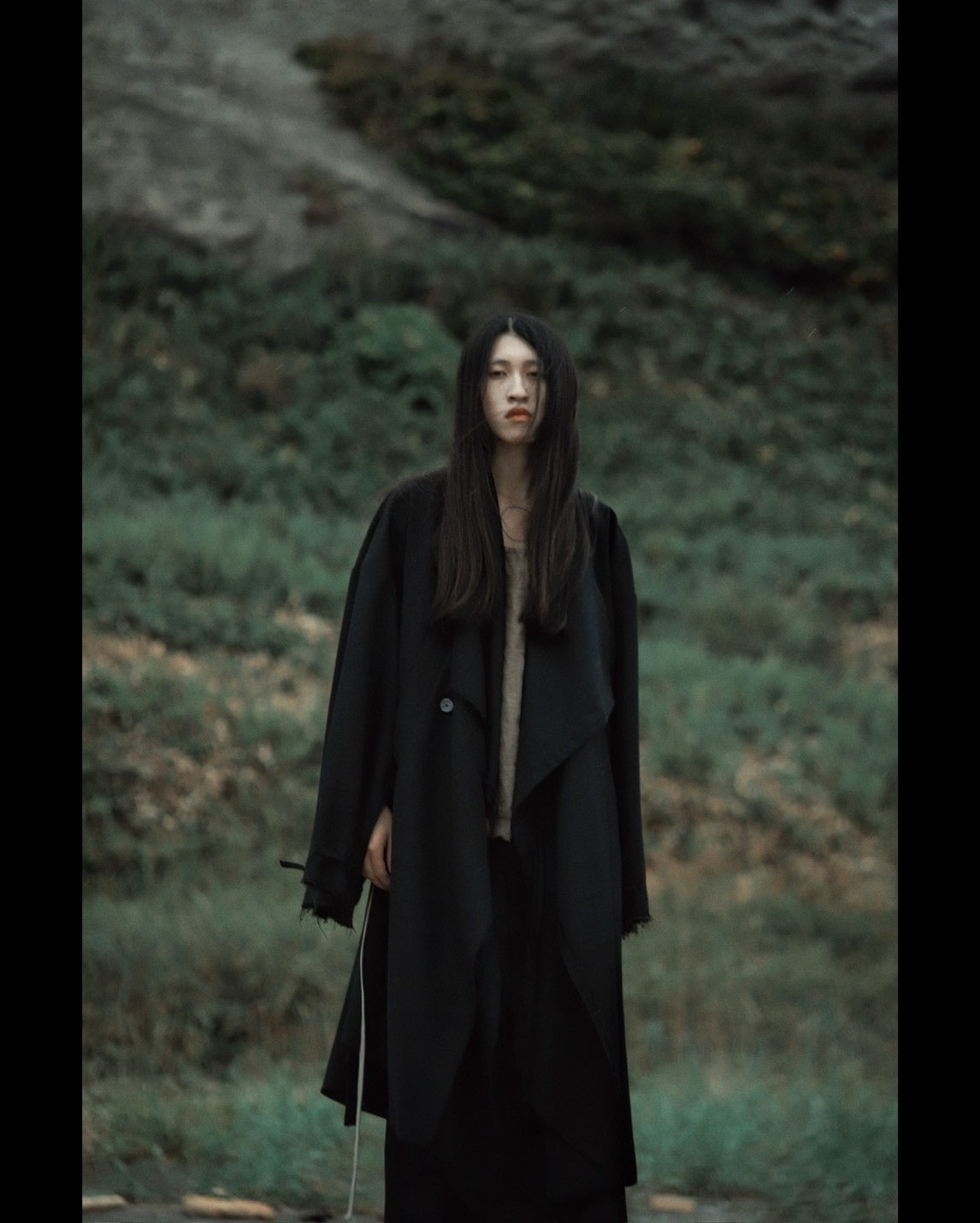 layered frayed coat