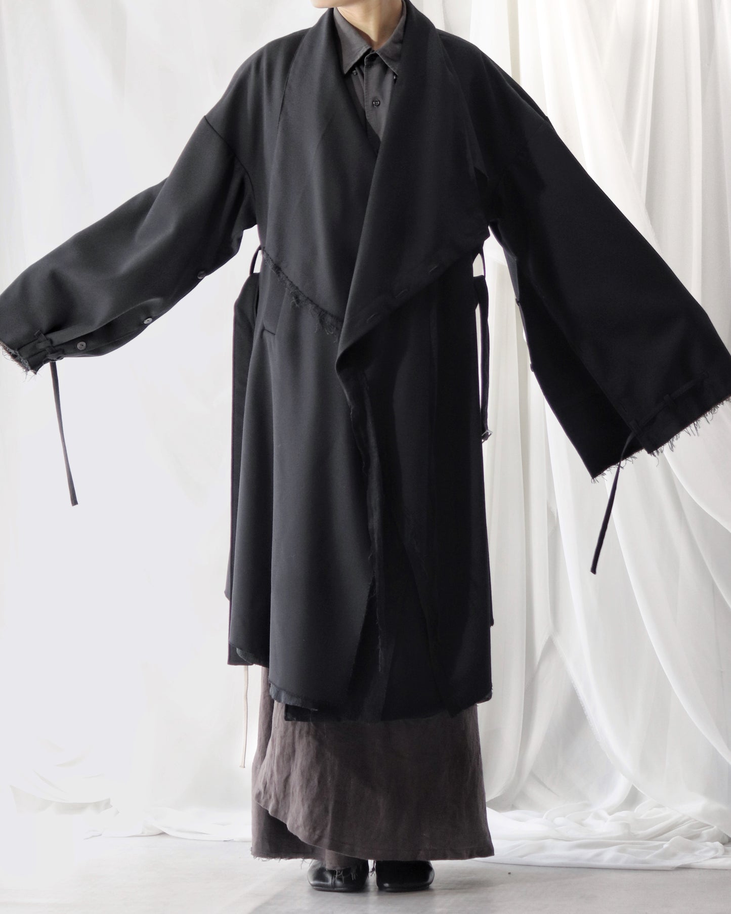 layered frayed coat