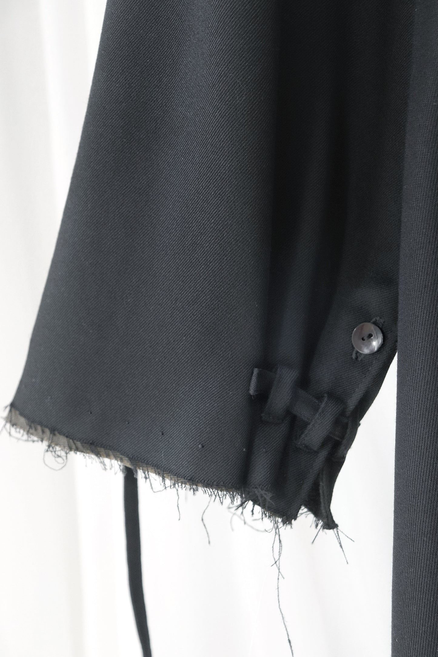 layered frayed coat