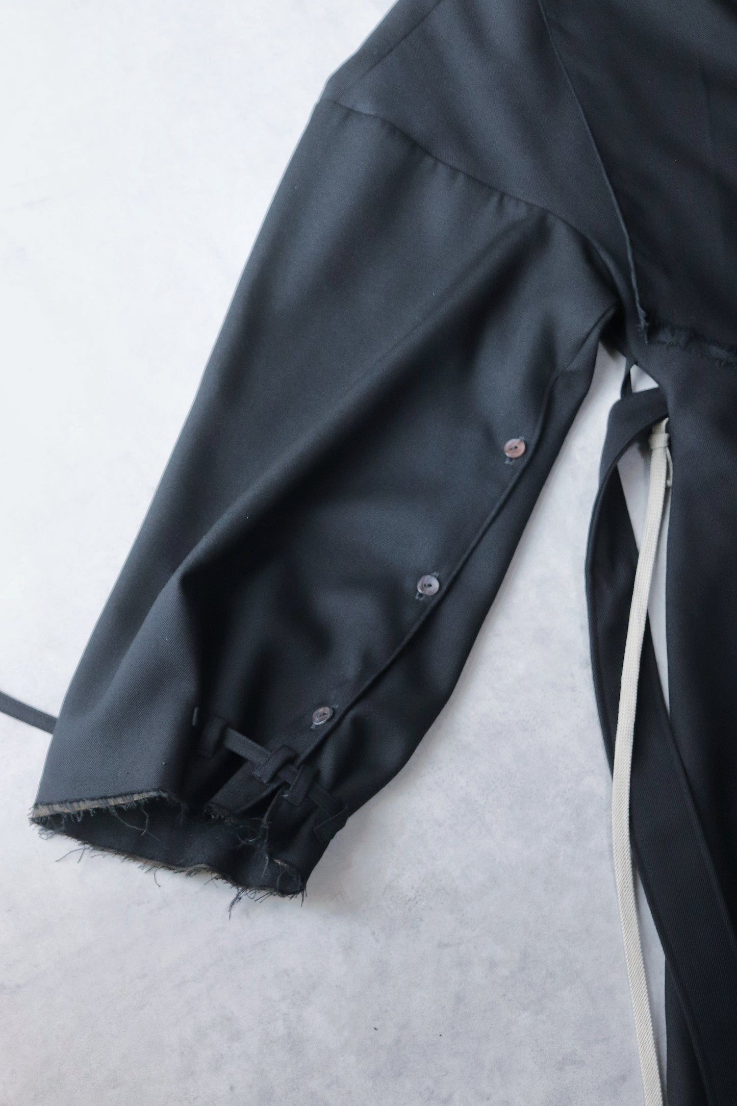 layered frayed coat