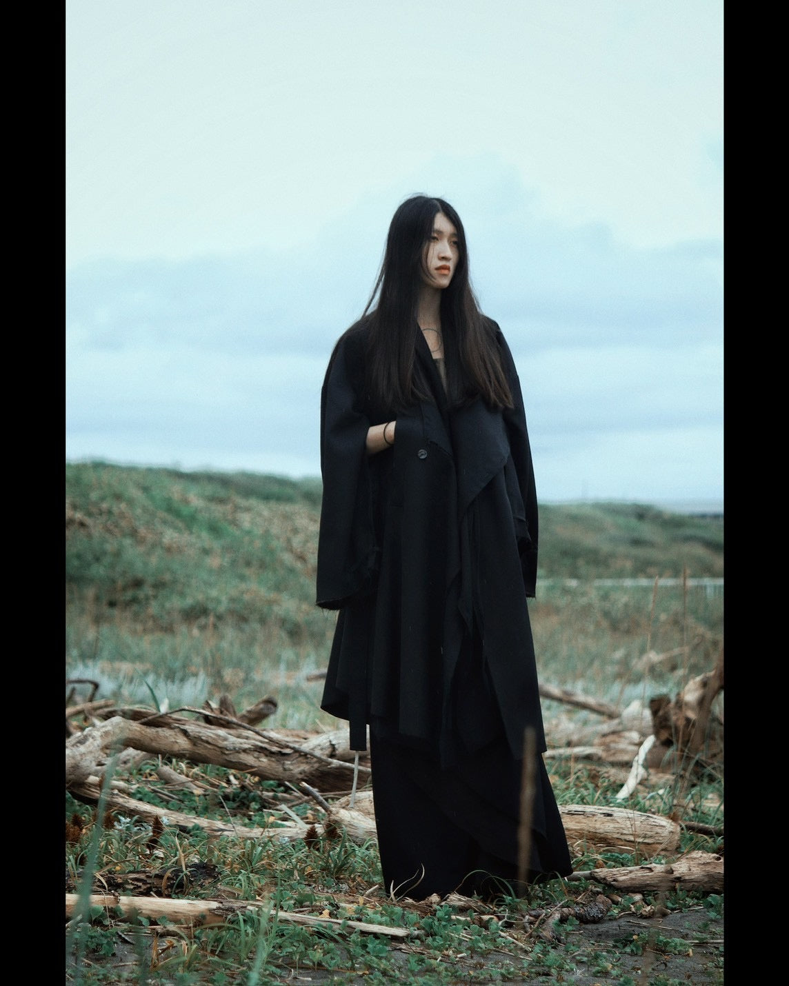 layered frayed coat
