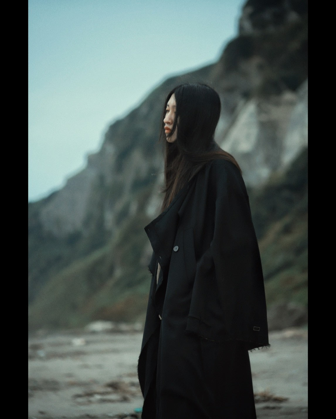 layered frayed coat