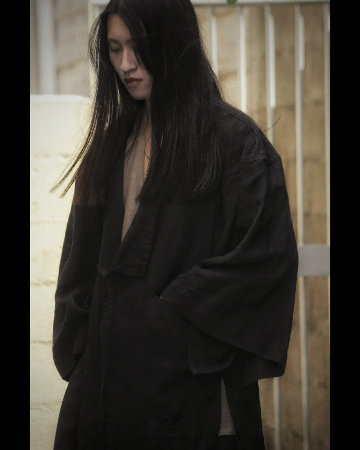 wide shoulder knee-length coat