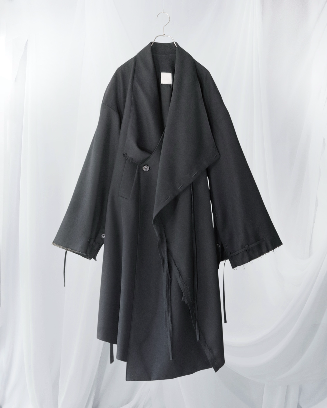 layered frayed coat
