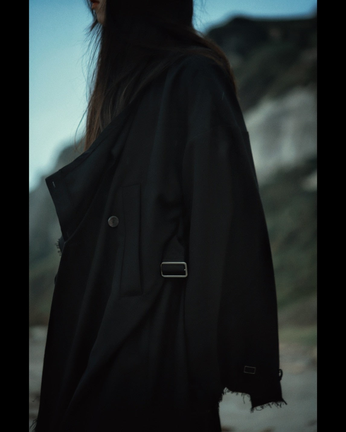 layered frayed coat