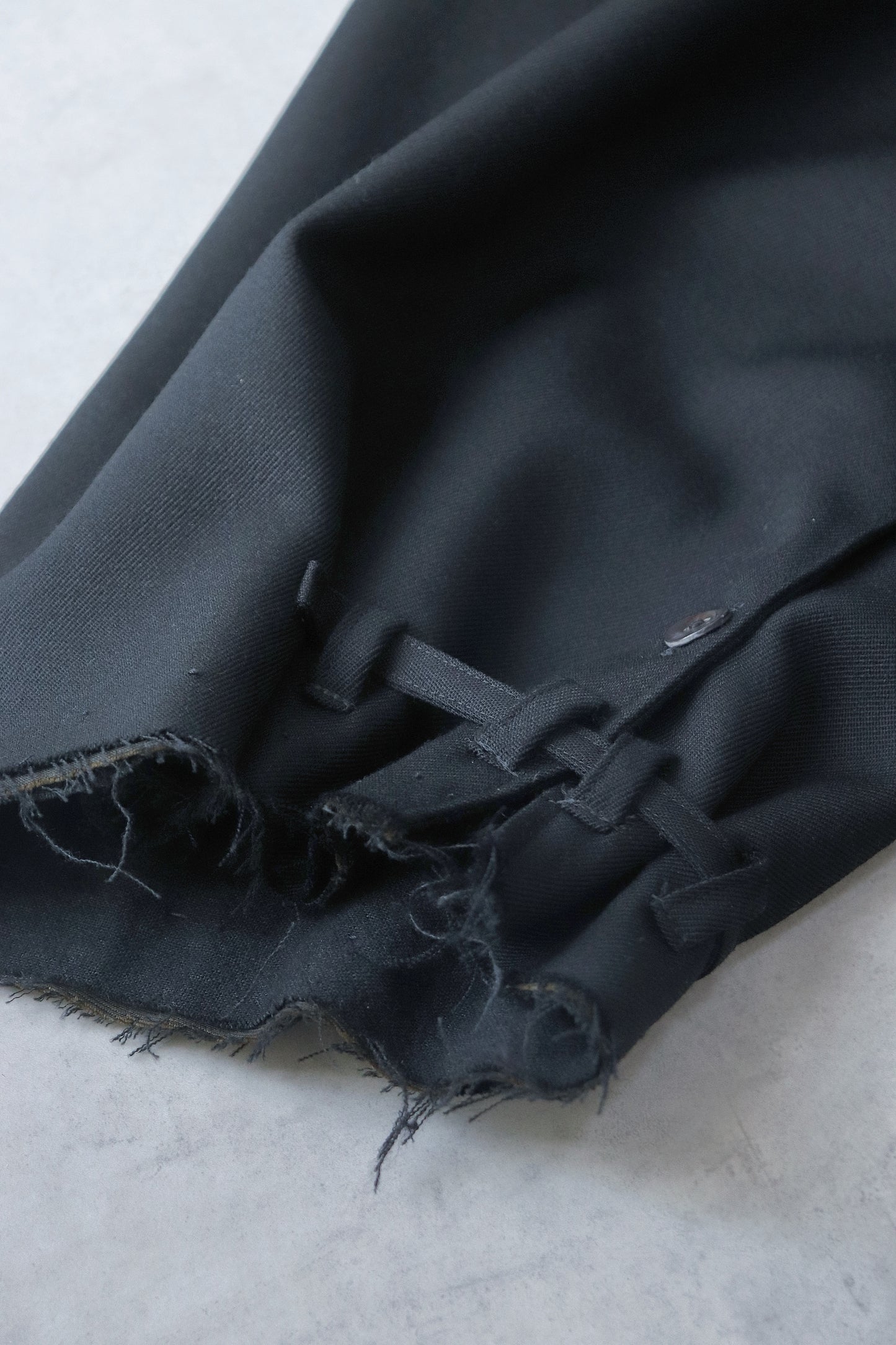 layered frayed coat