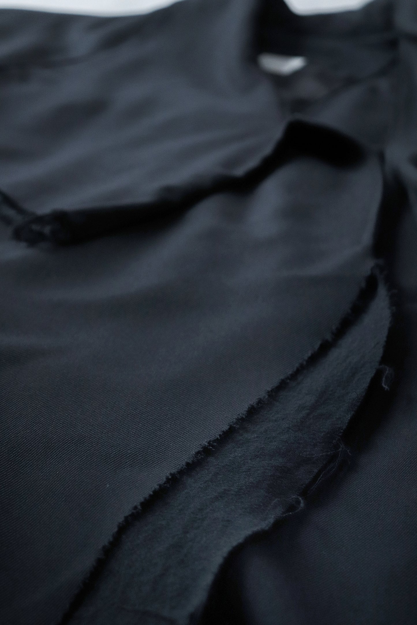 layered frayed coat