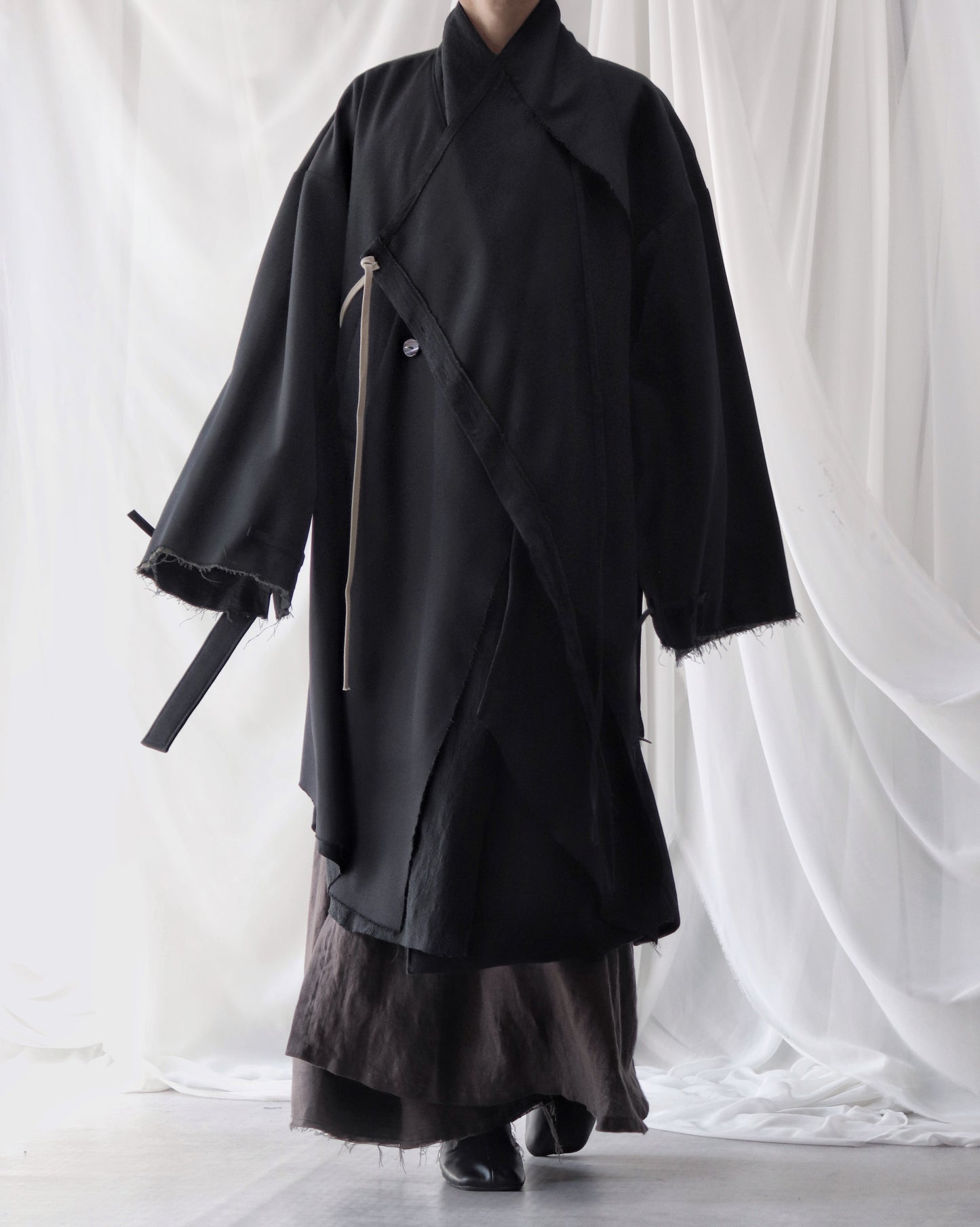 layered frayed coat