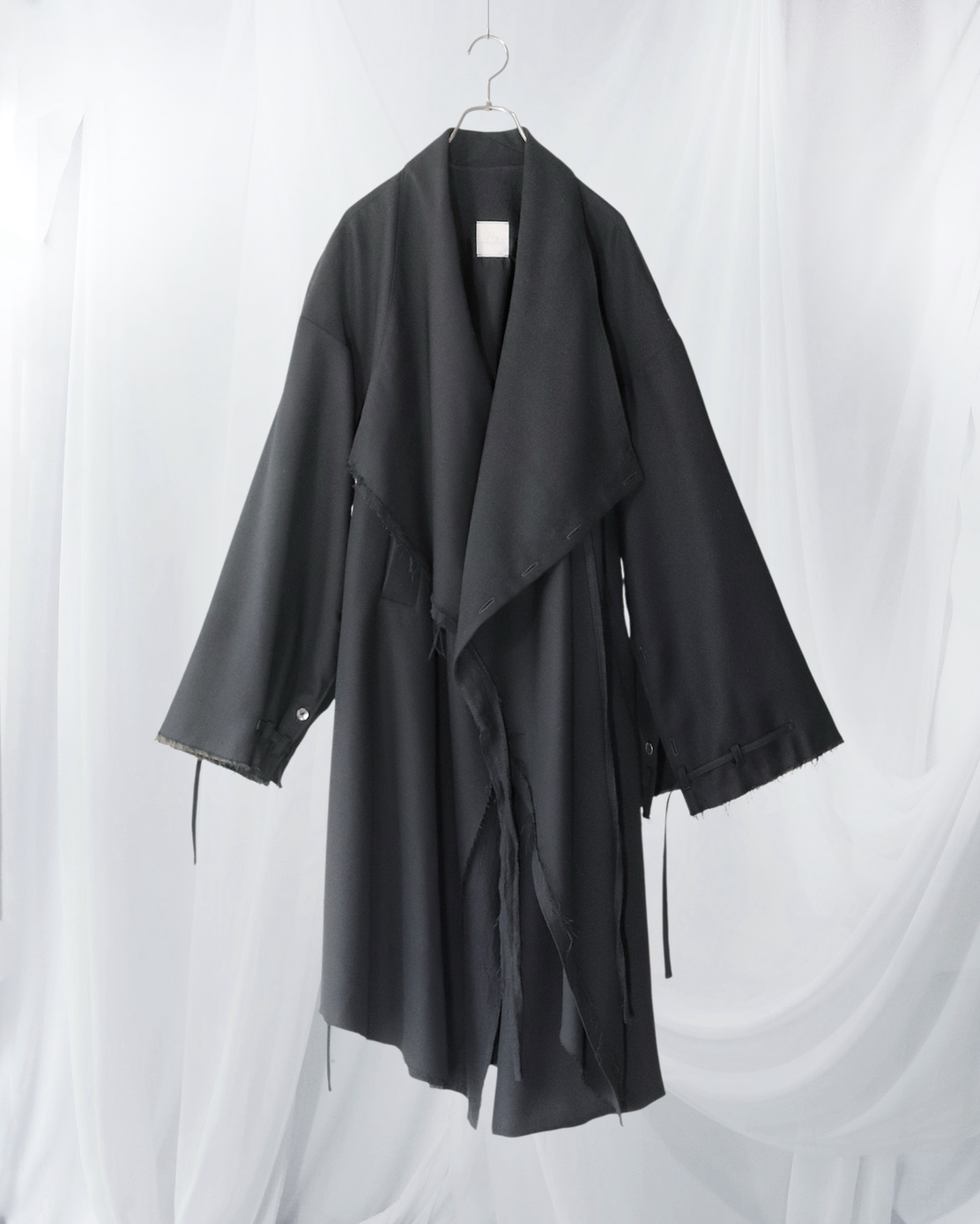layered frayed coat
