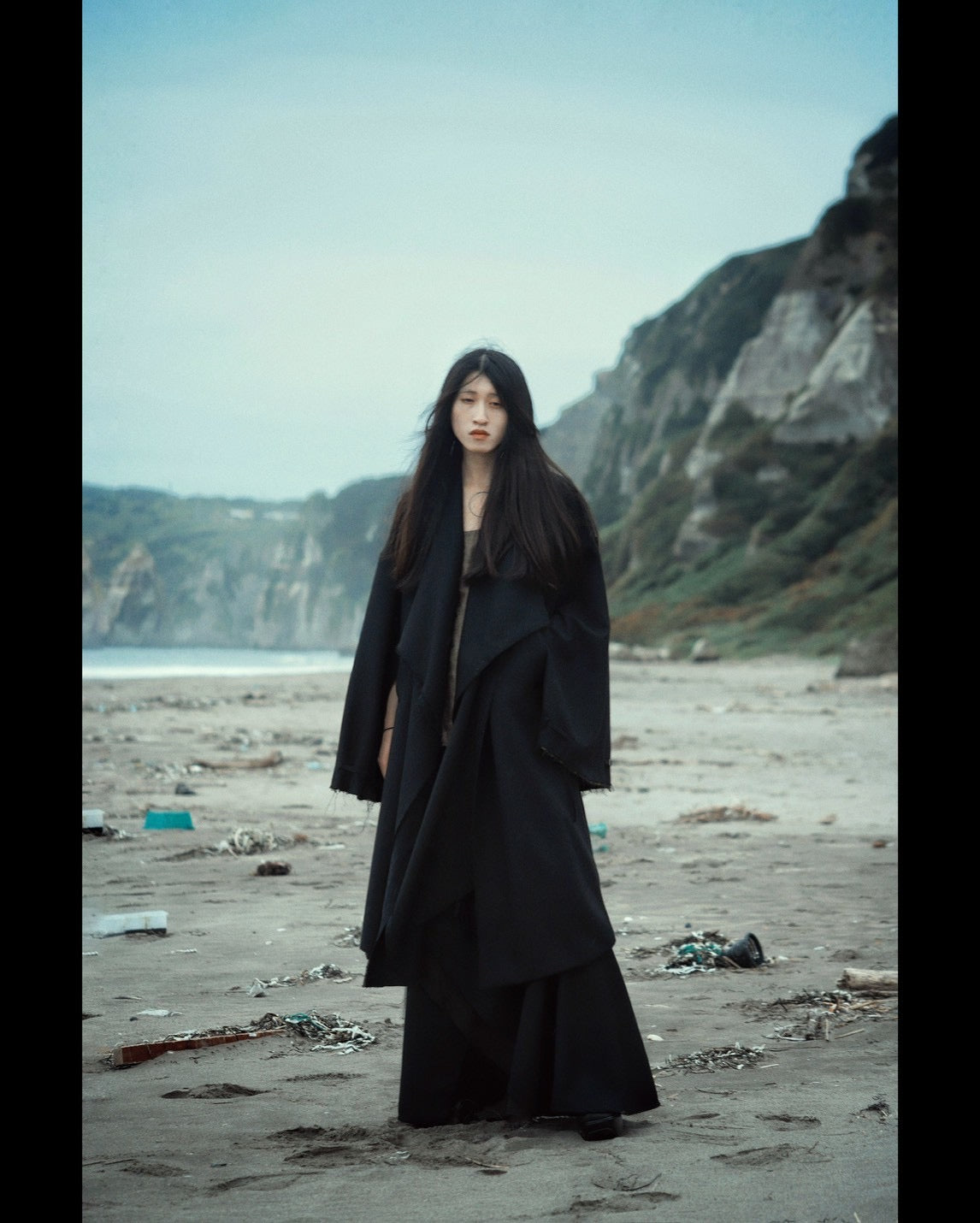 layered frayed coat