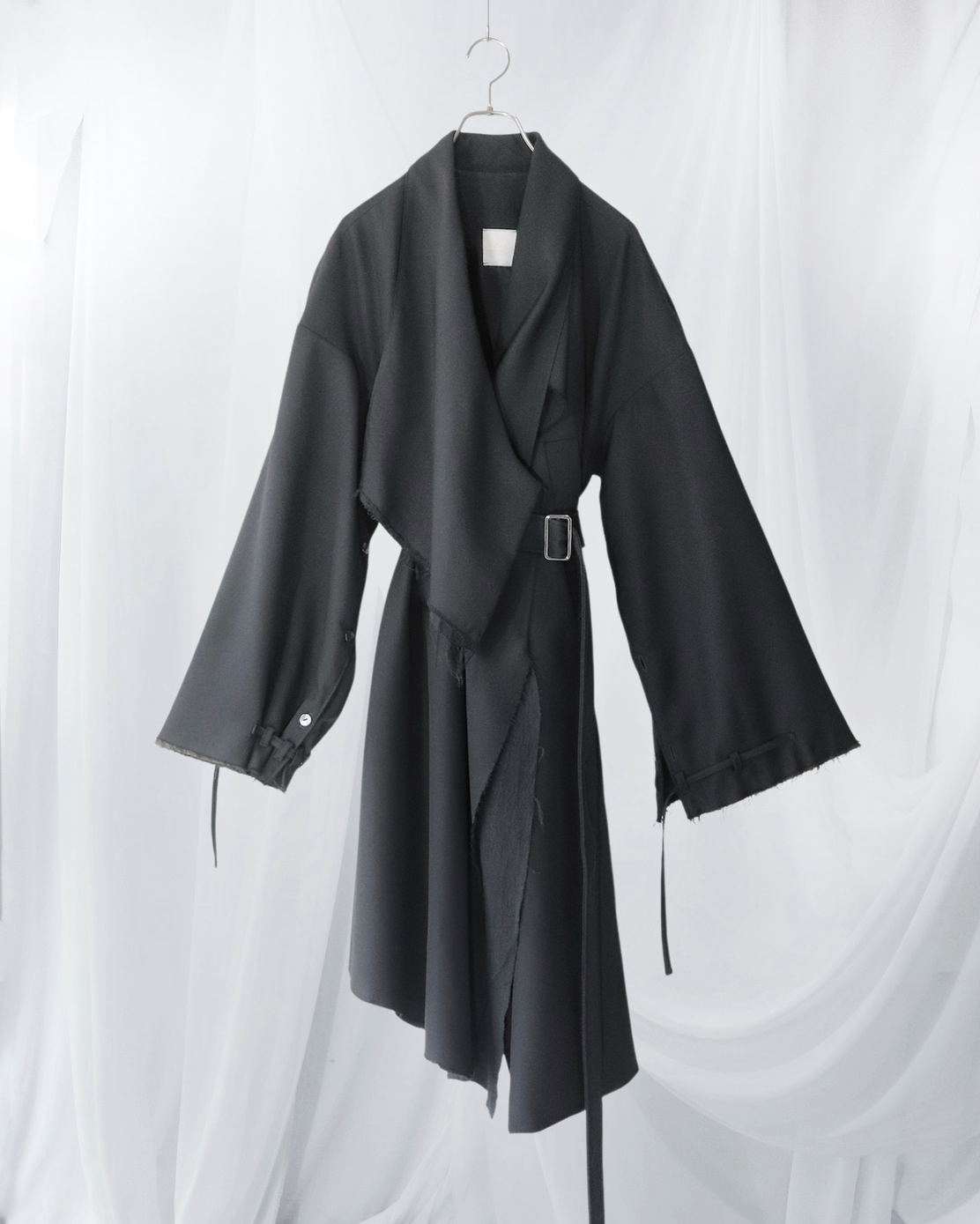 layered frayed coat