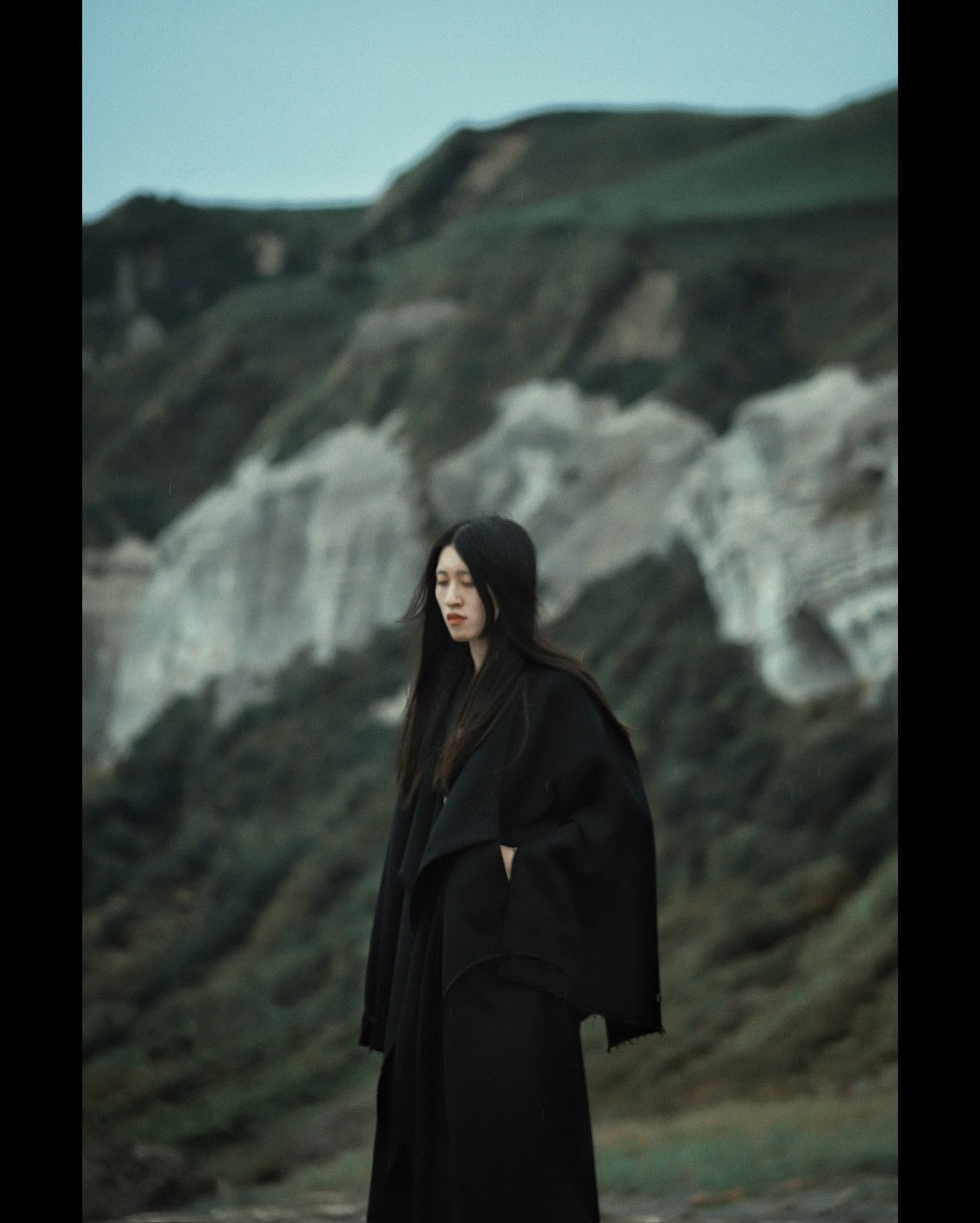 layered frayed coat