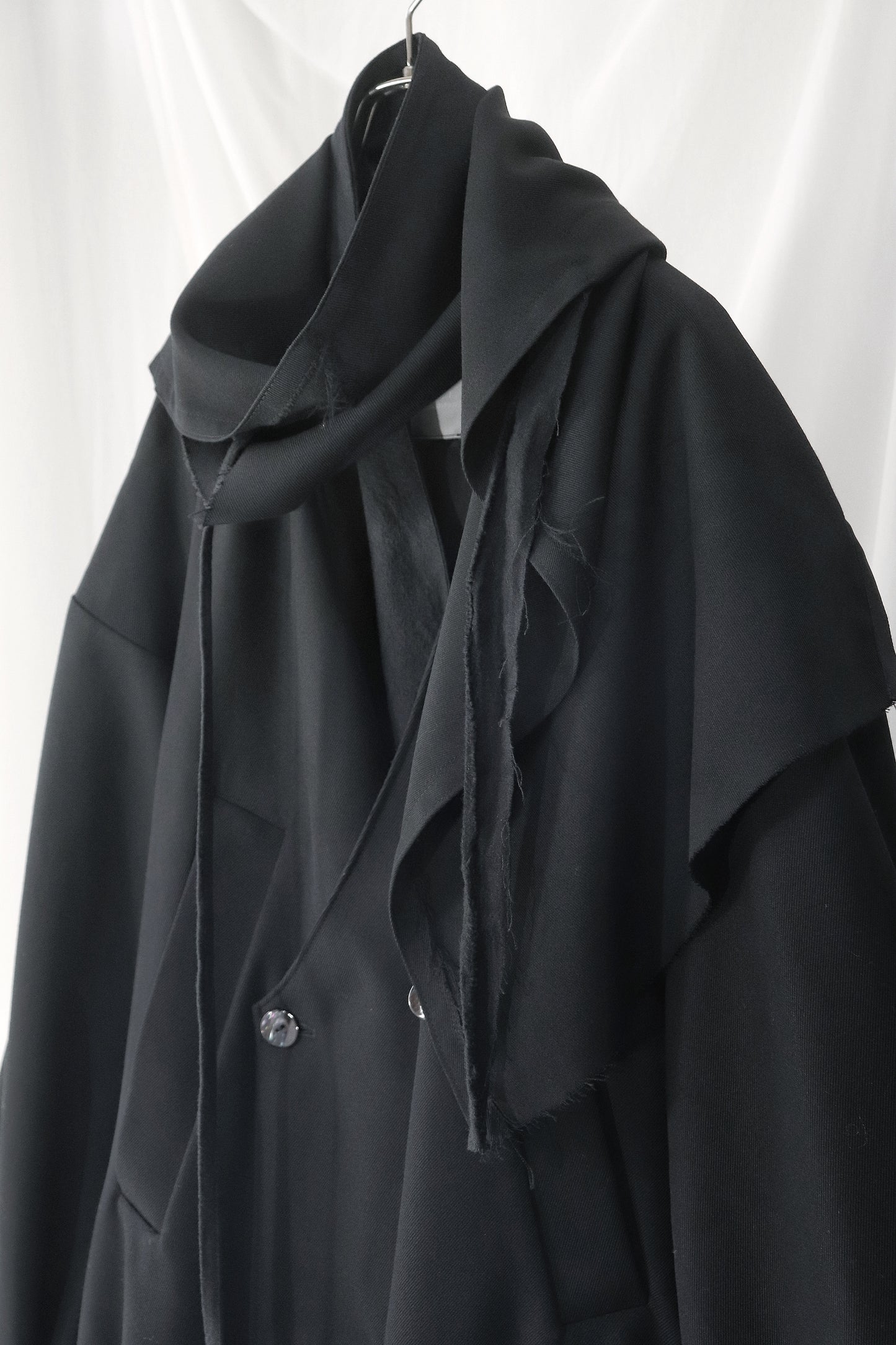 layered frayed coat