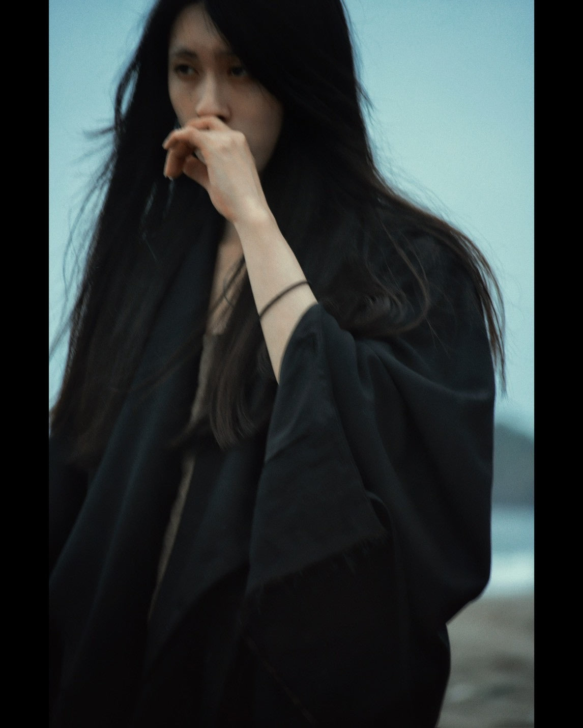 layered frayed coat