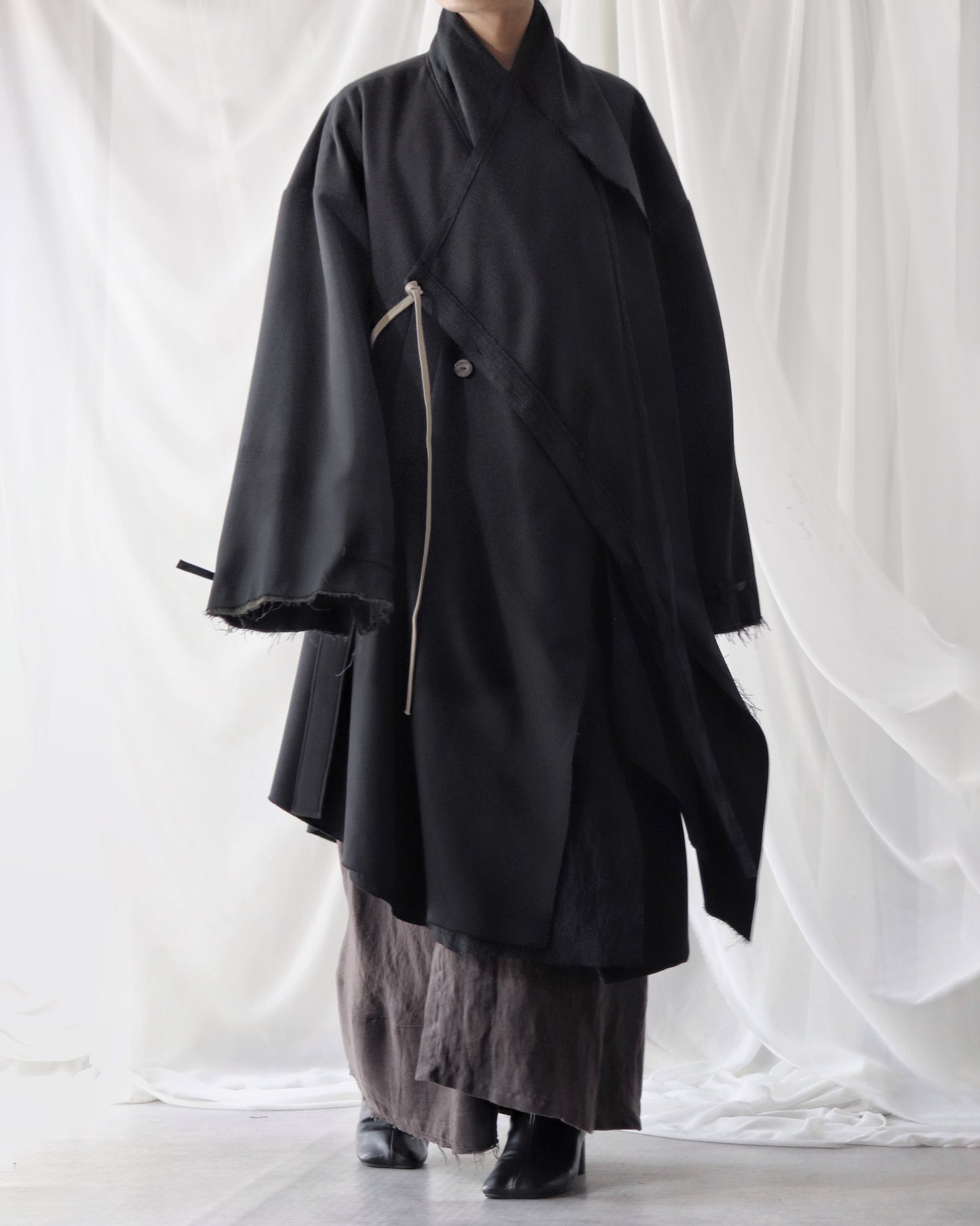 layered frayed coat