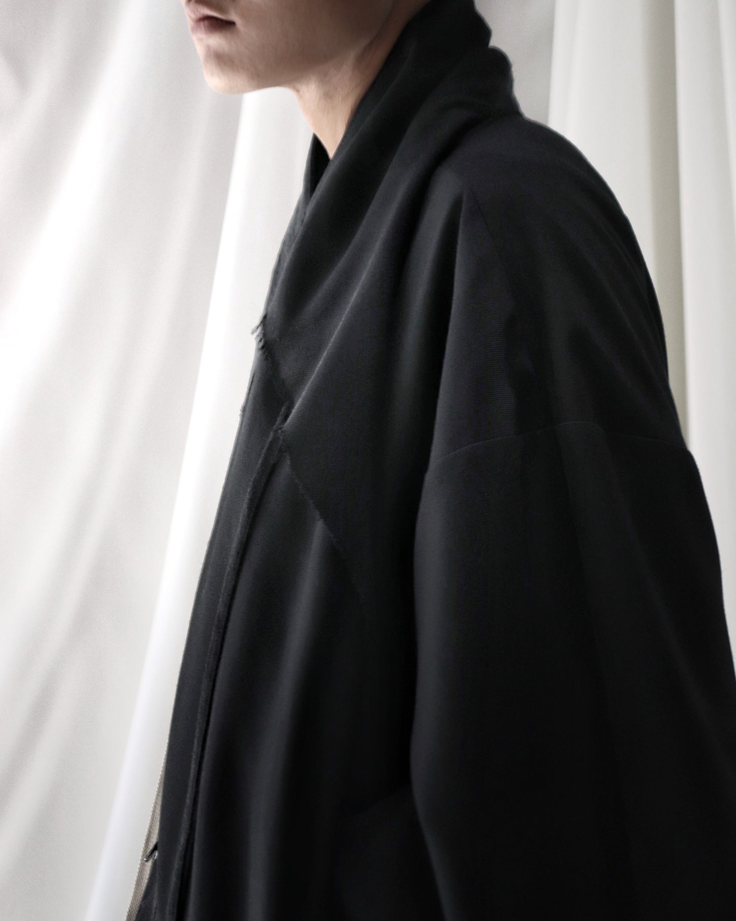 layered frayed coat