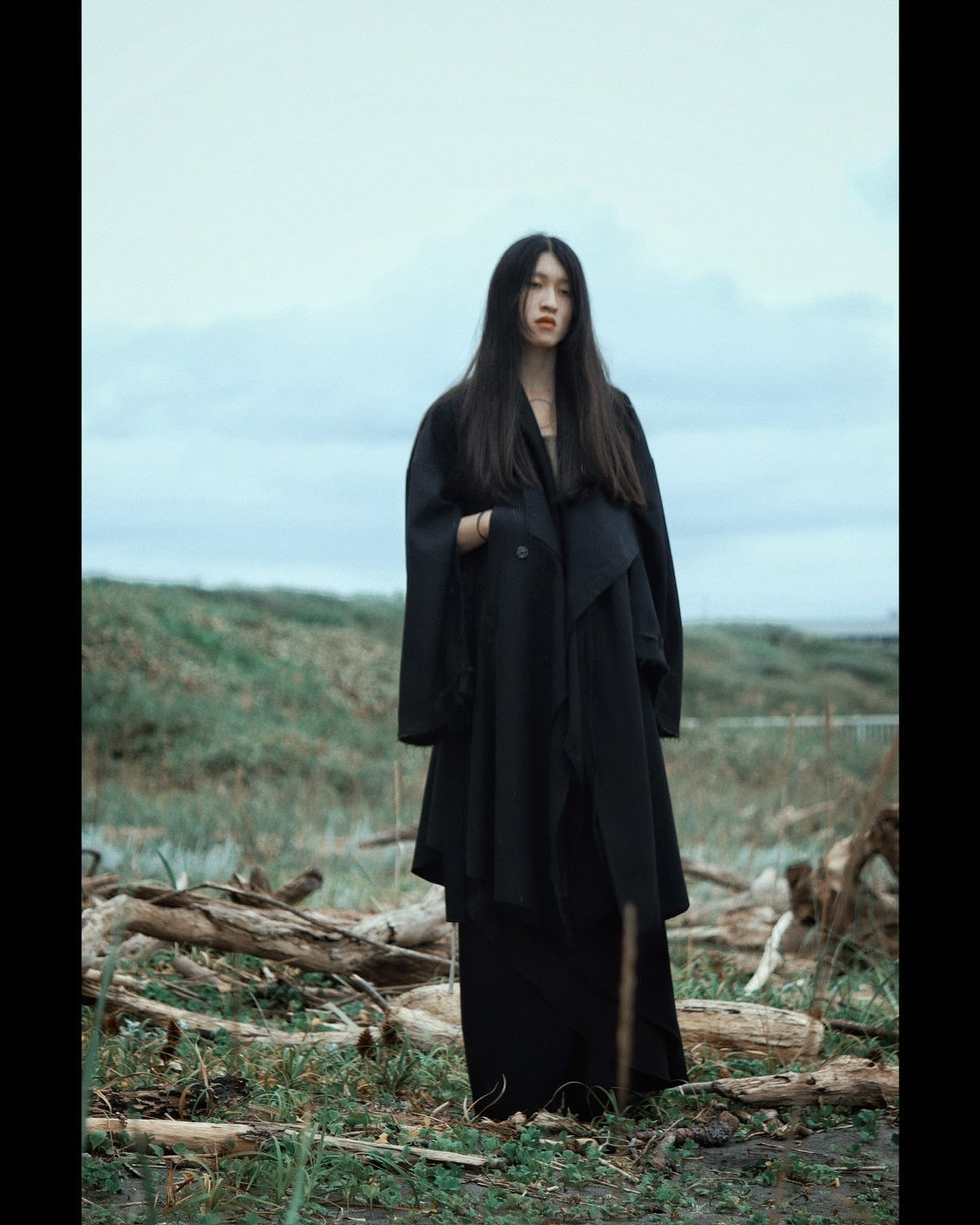 layered frayed coat