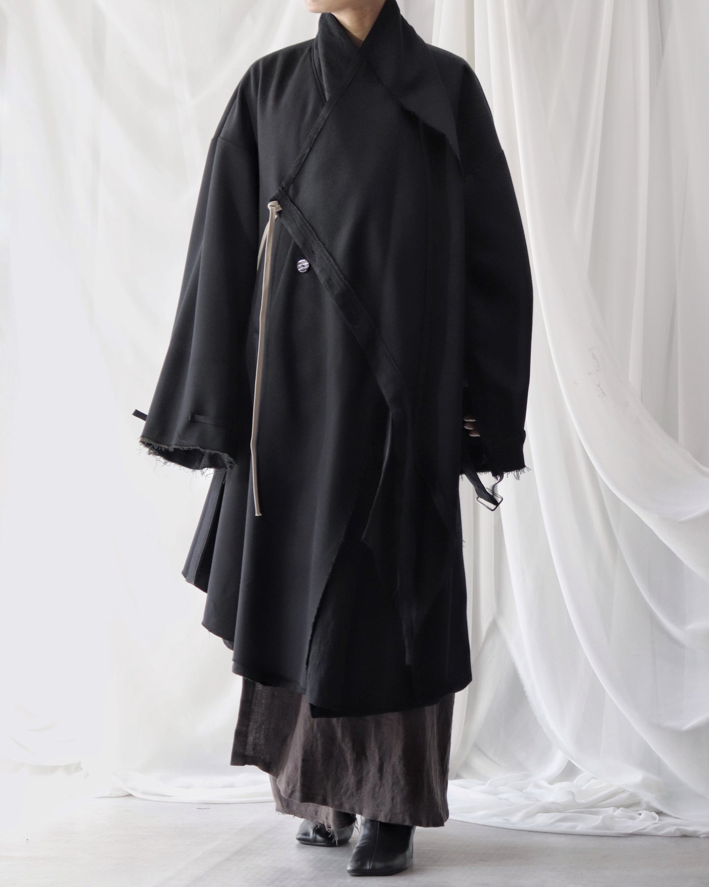 layered frayed coat