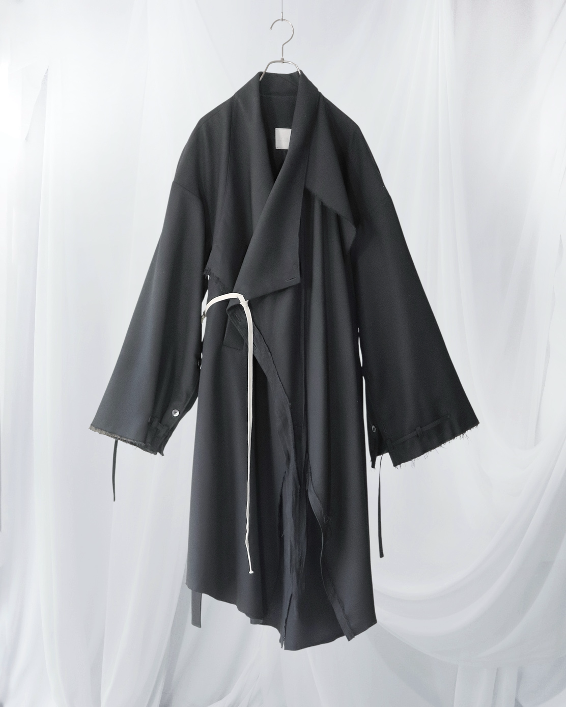 layered frayed coat