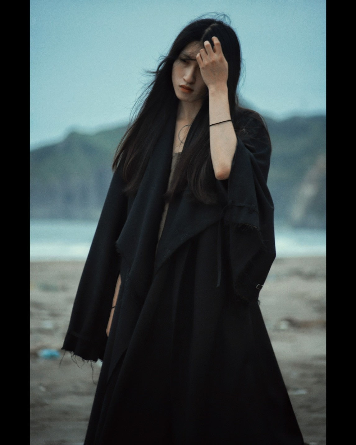 layered frayed coat