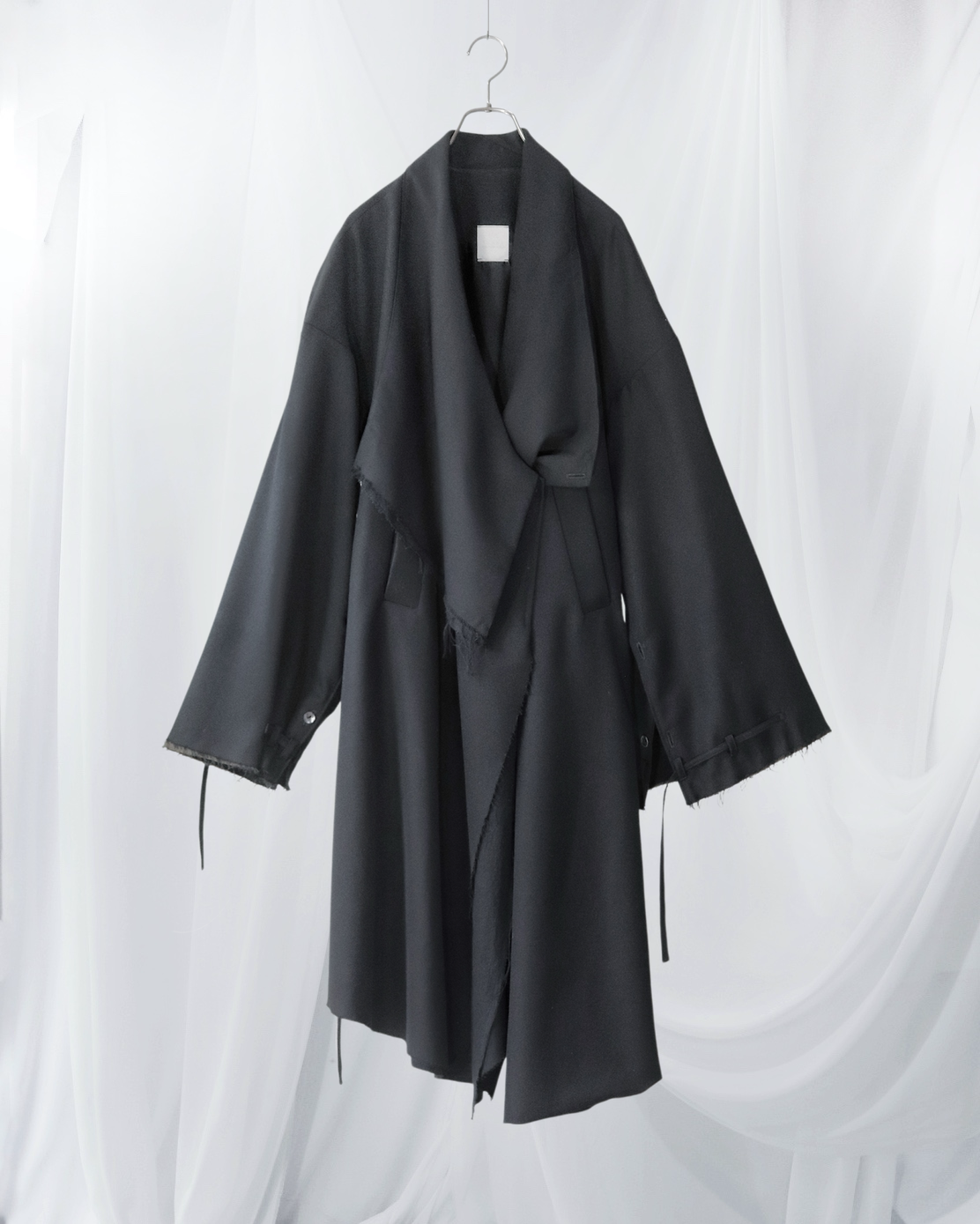layered frayed coat