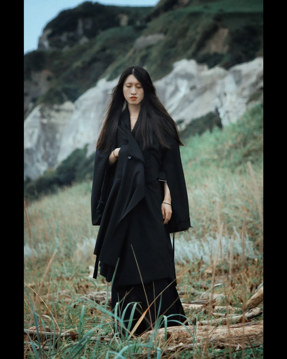 layered frayed coat