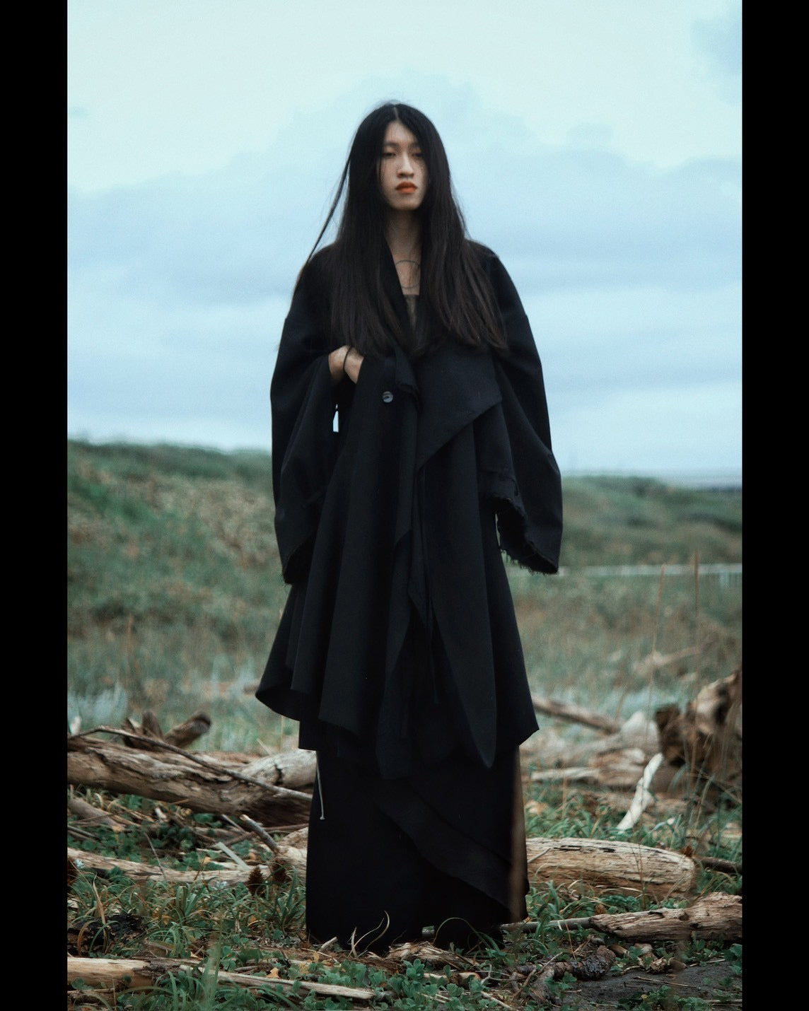 layered frayed coat