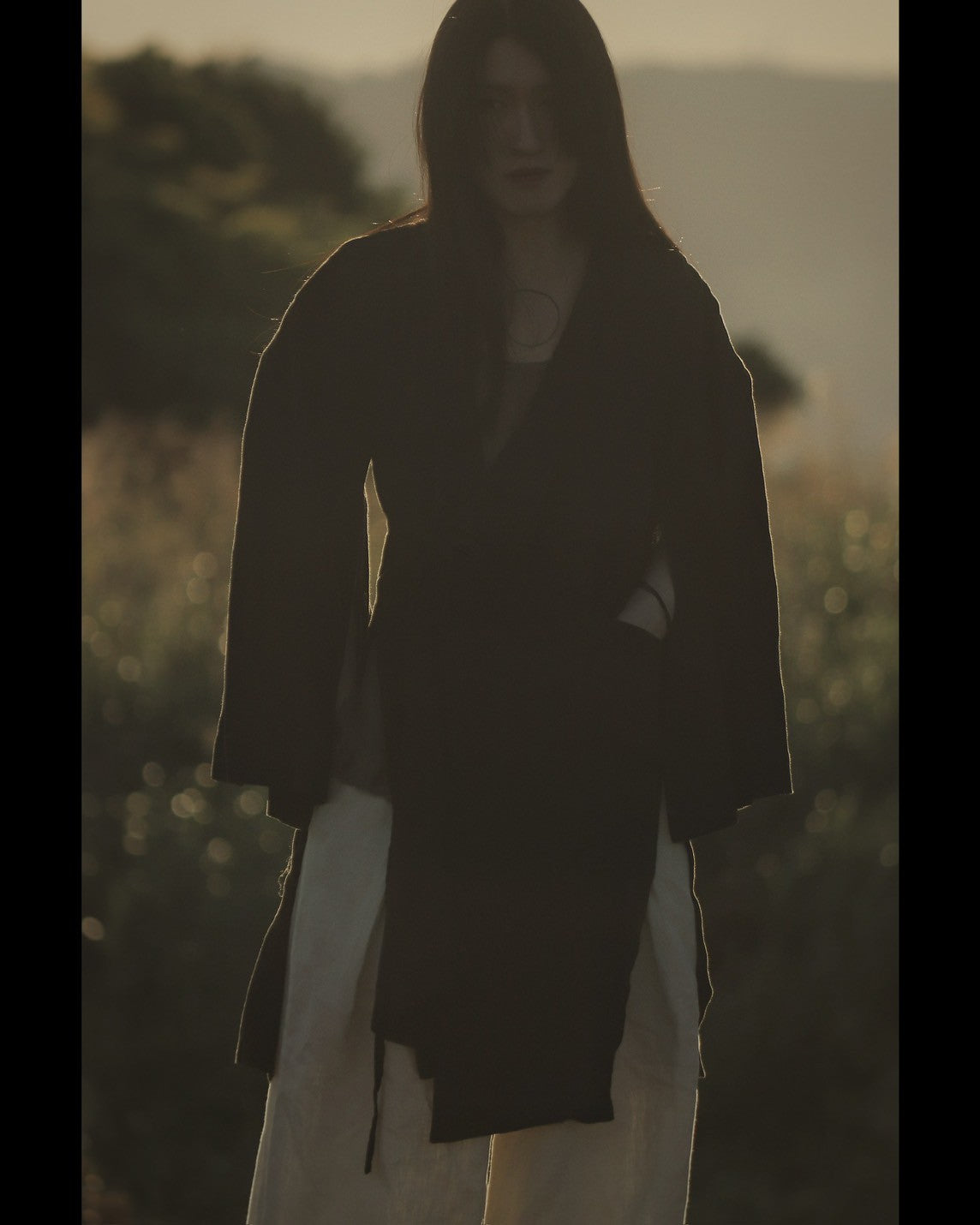 wide shoulder knee-length coat