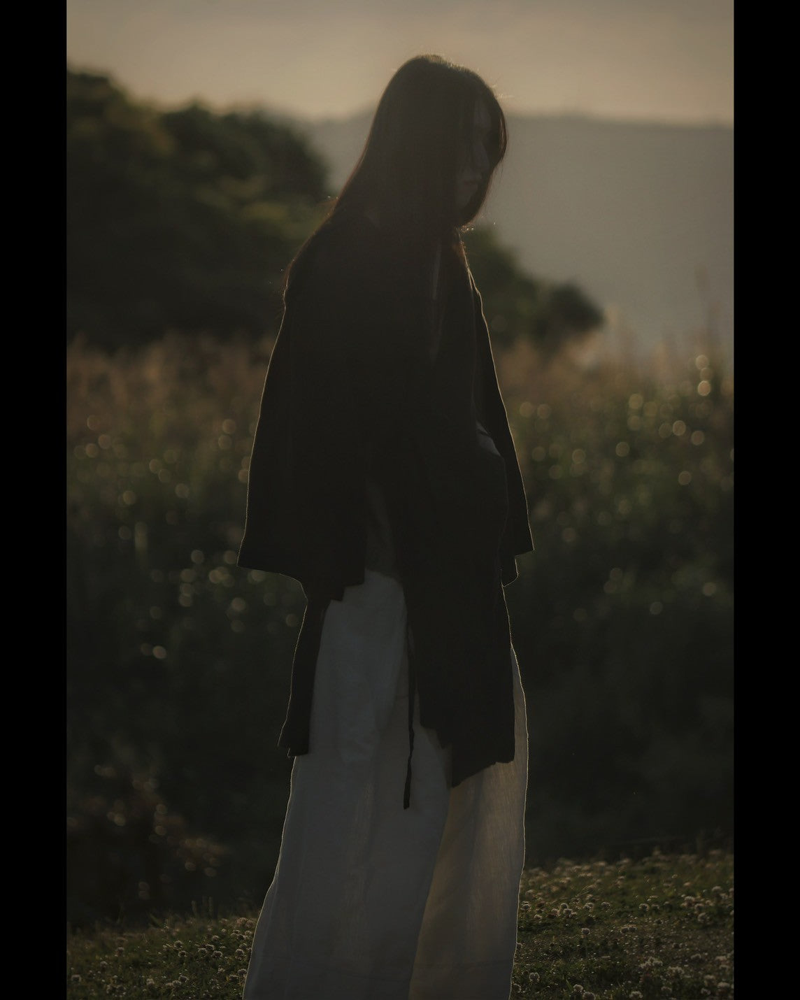 wide shoulder knee-length coat