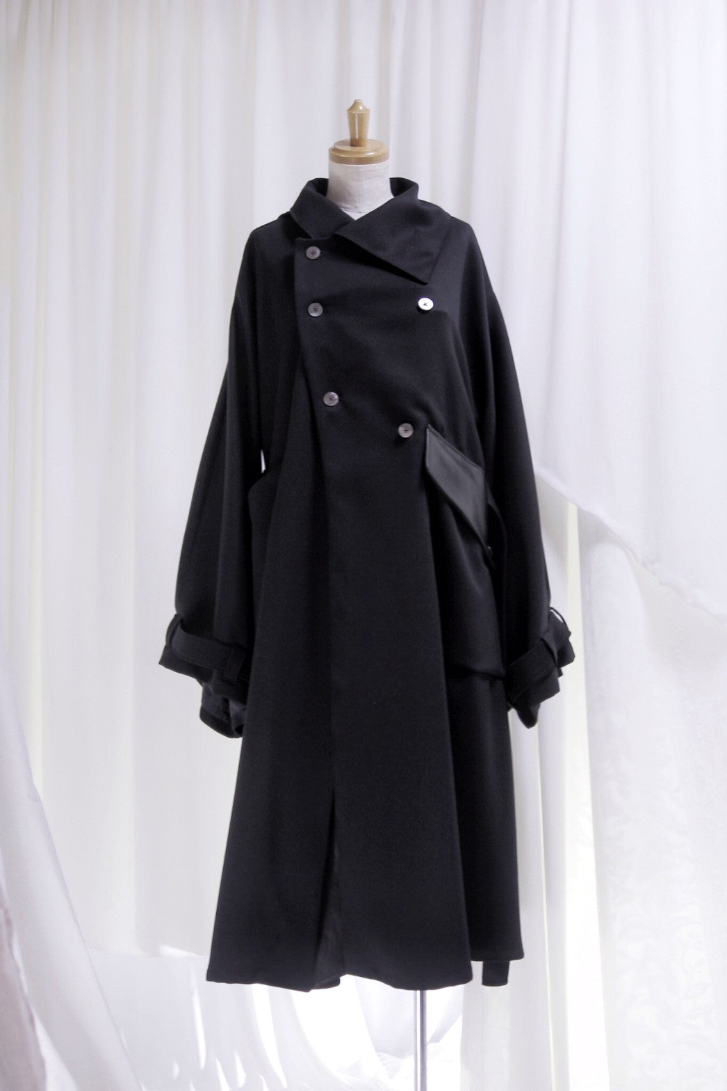 wool × leather layered coat