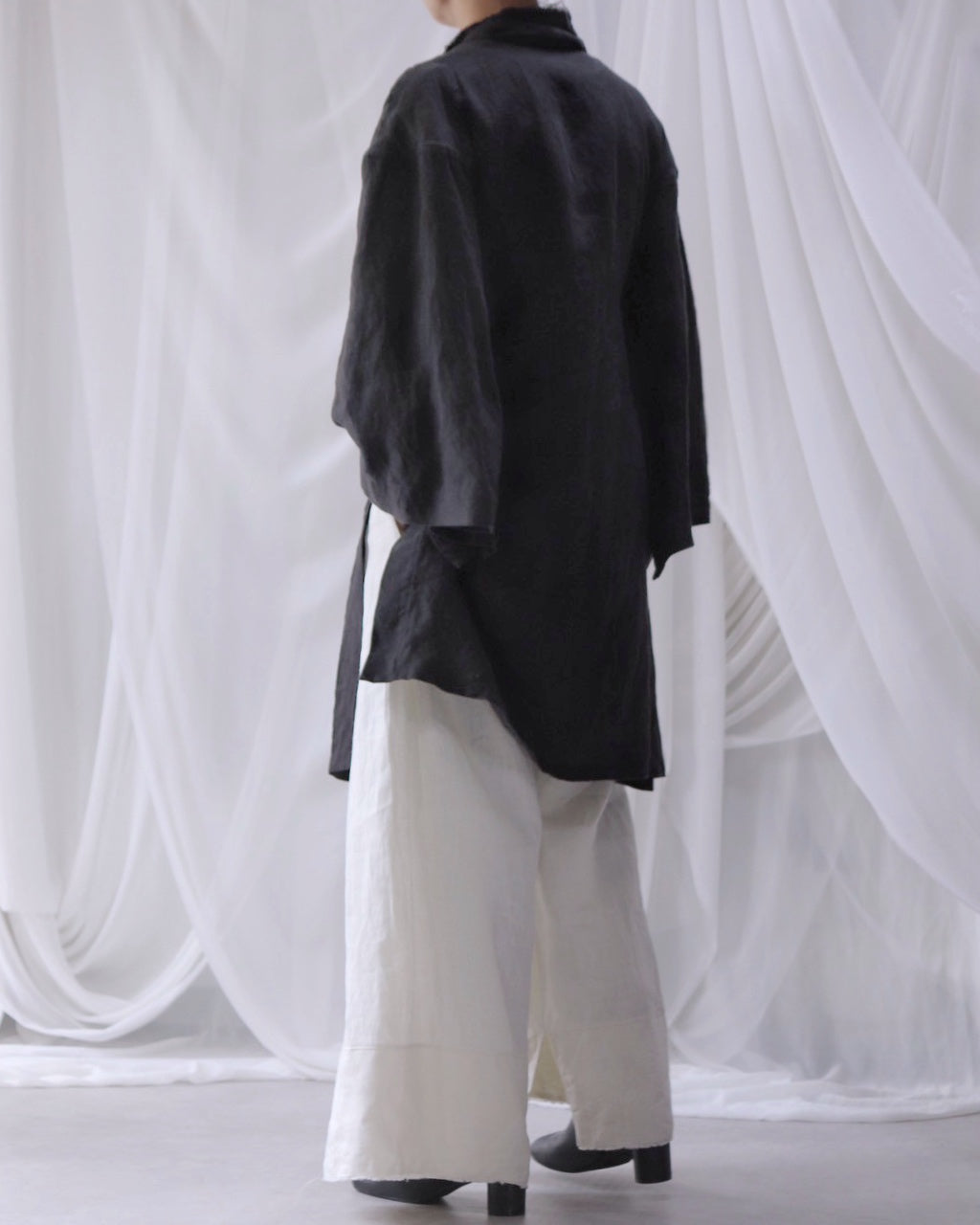 wide shoulder knee-length coat