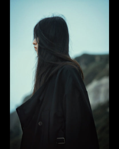 layered frayed coat