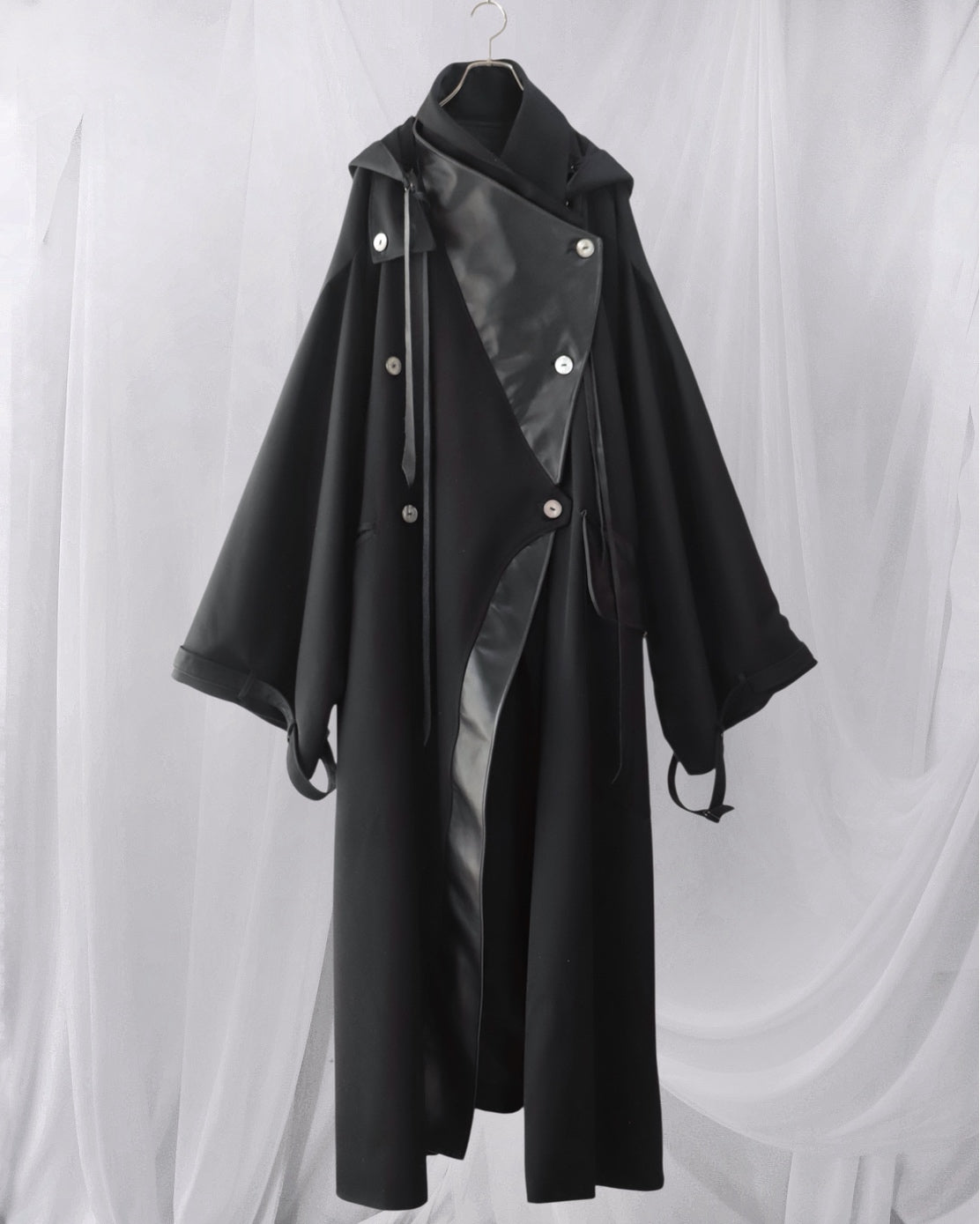 wool × leather layered coat