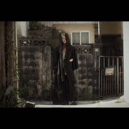 wide shoulder knee-length coat